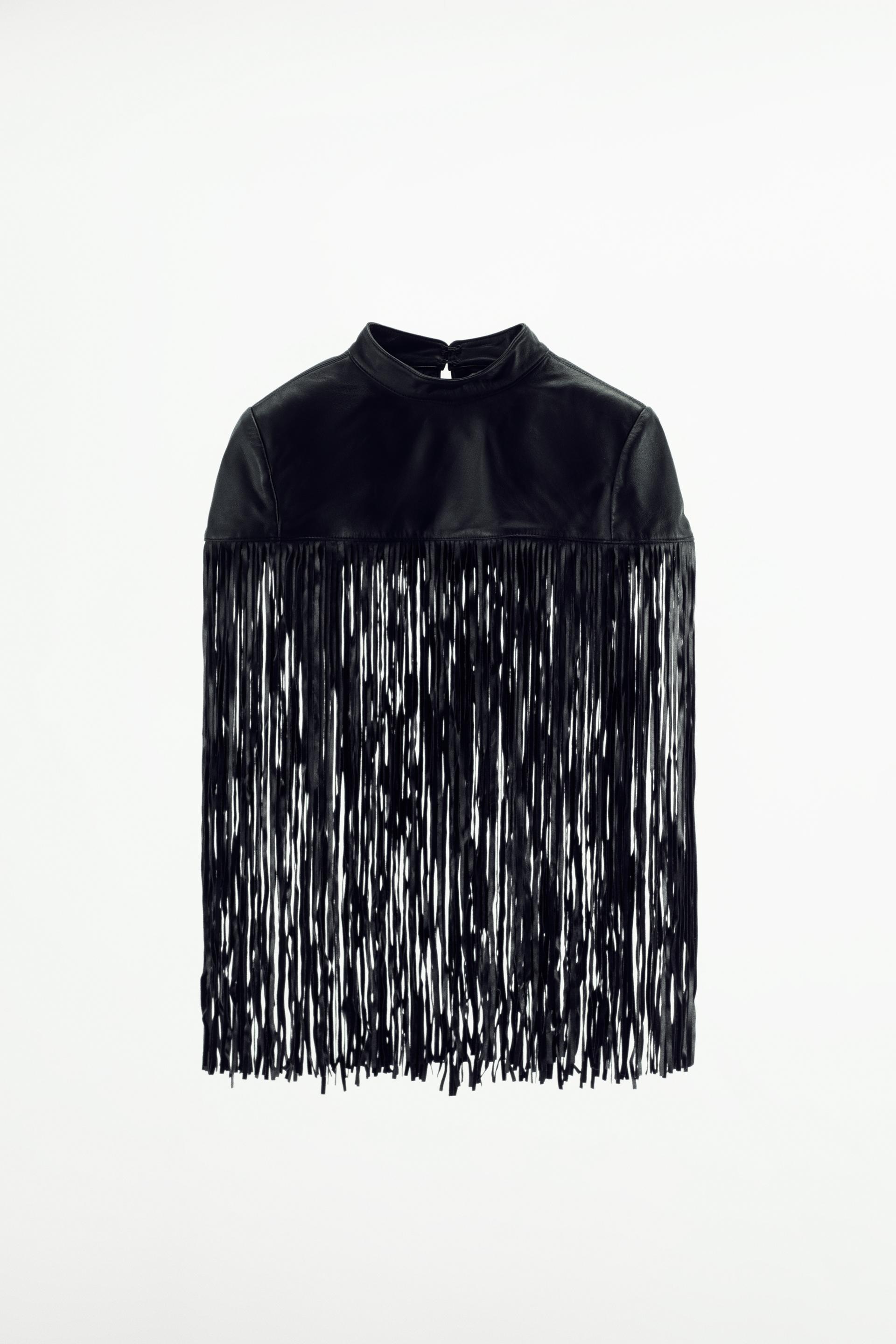 SHORT LEATHER CAPE WITH FRINGING