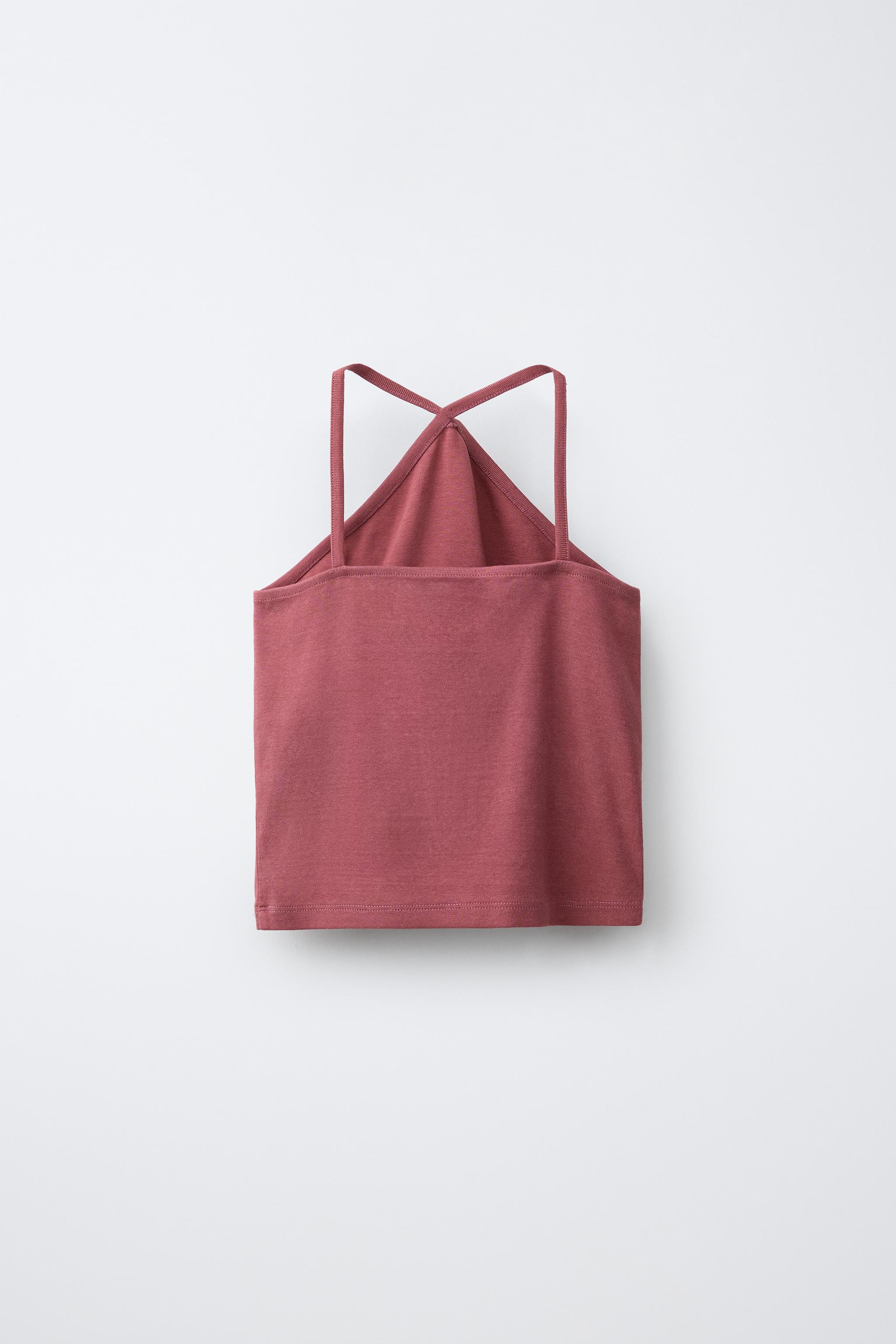 TOP À ENCOLURE HALTER CLOUTÉ