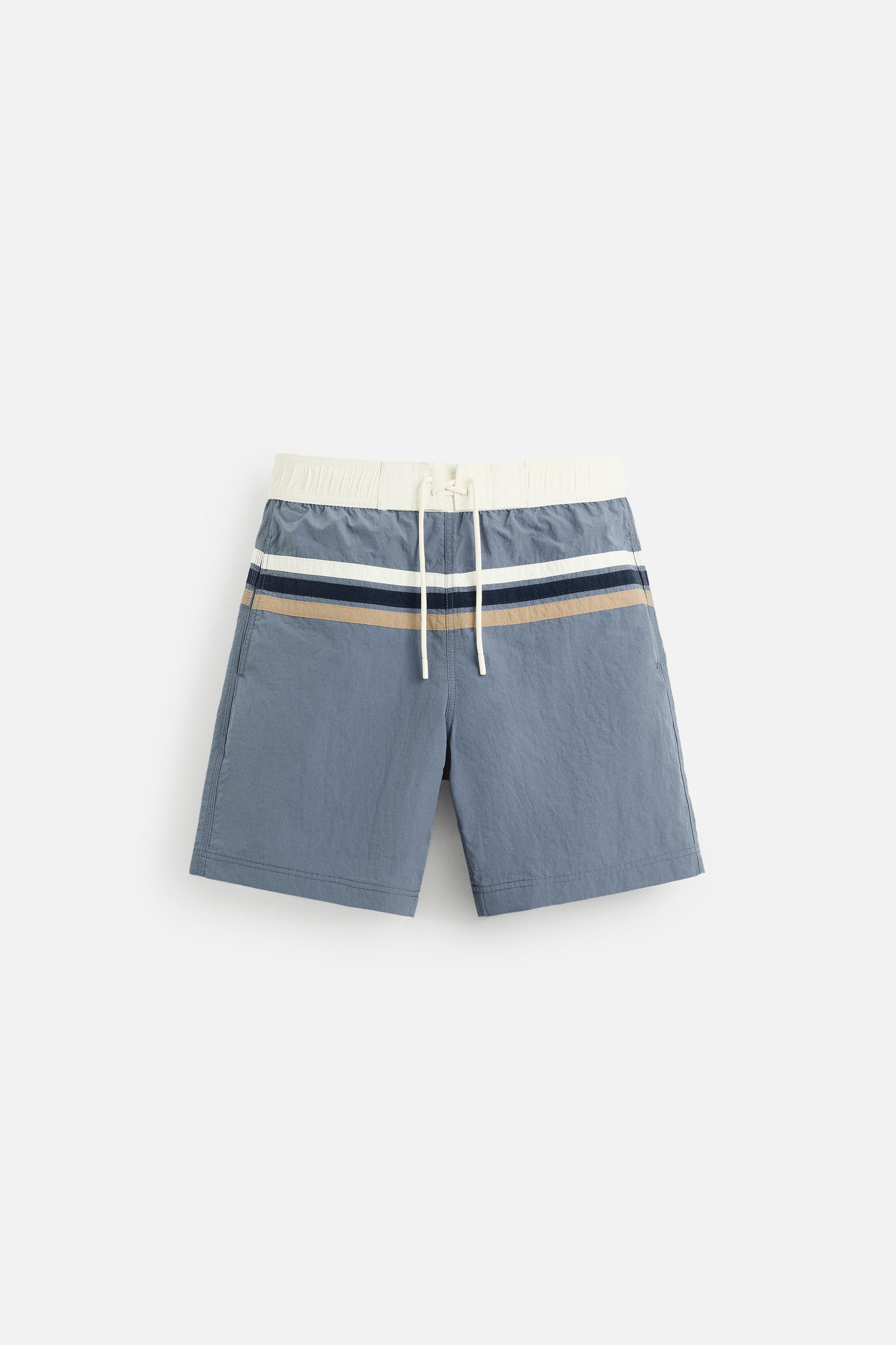 MAILLOT DE BAIN LONG À BANDES