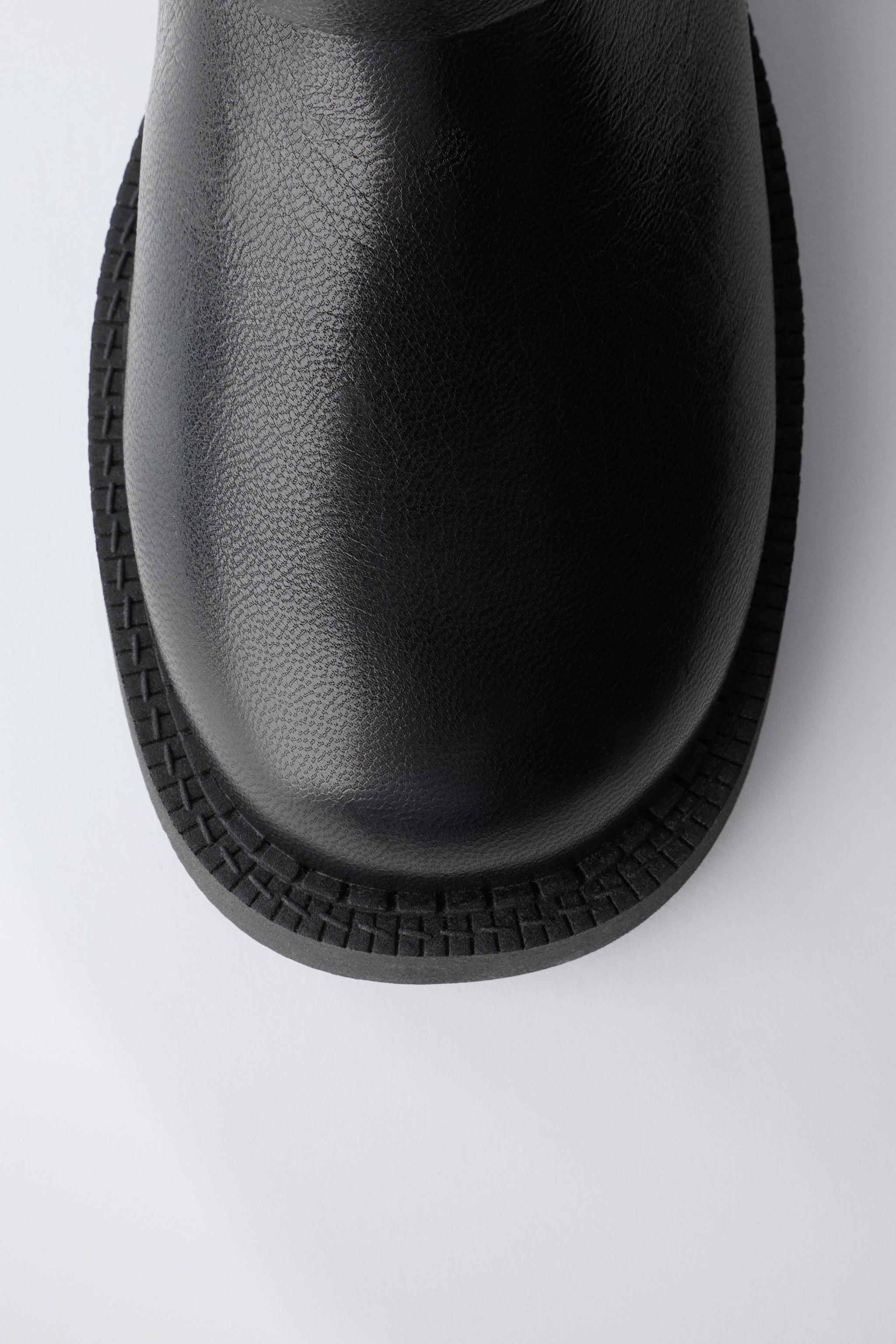 BUCKLED LEATHER BOOTS