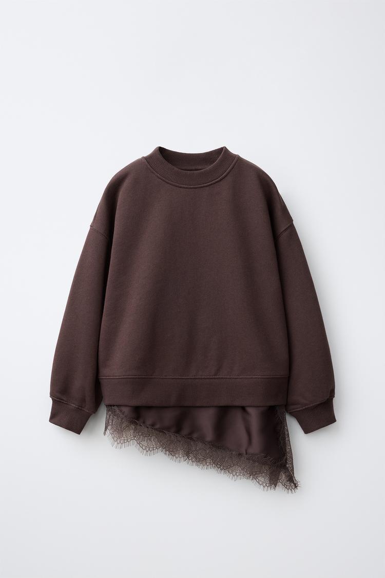 Sudadera bajo combinado encaje