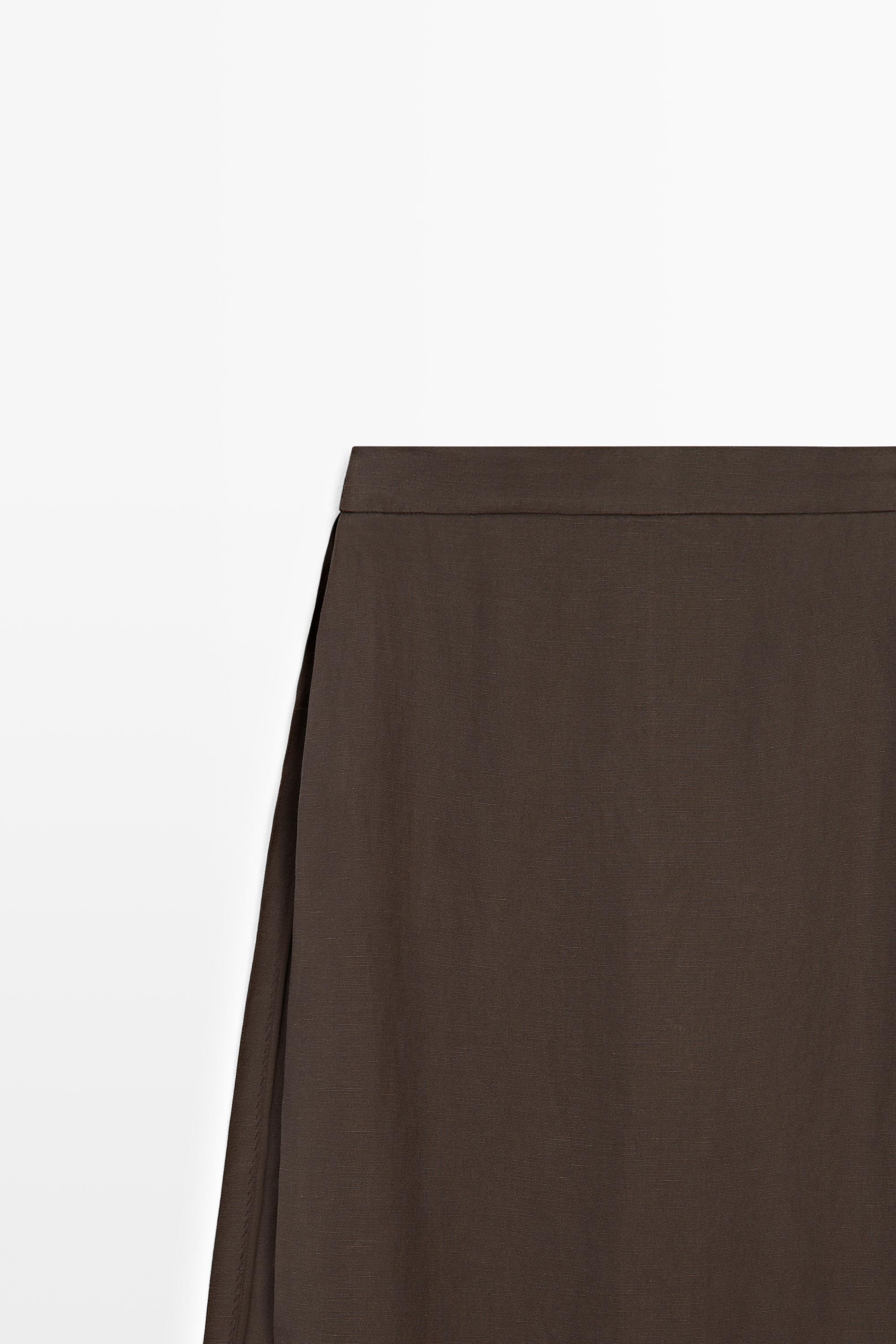 Flowing trousers with skirt detail