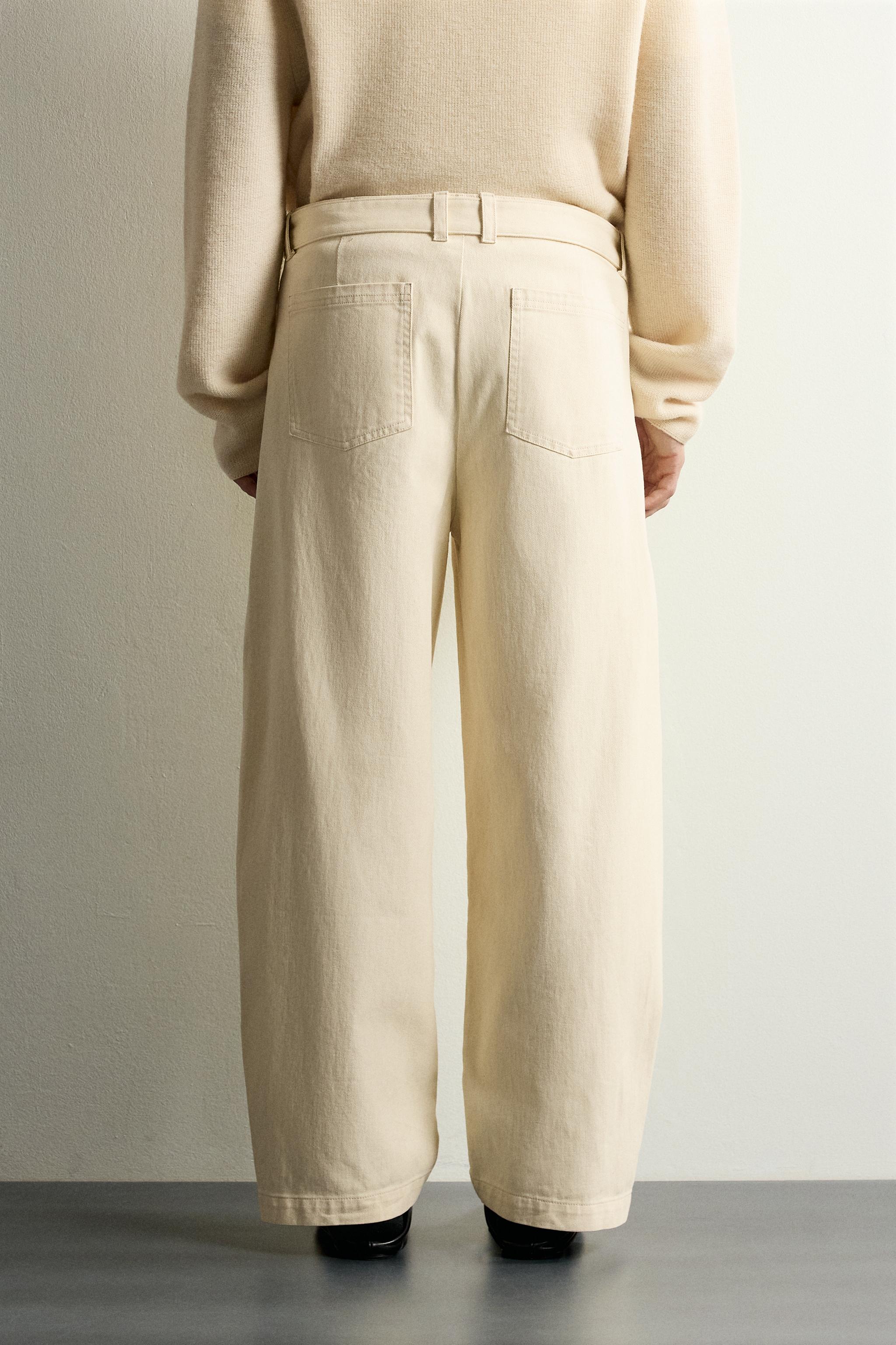 BELTED PLEATED RELAXED FIT PANTS
