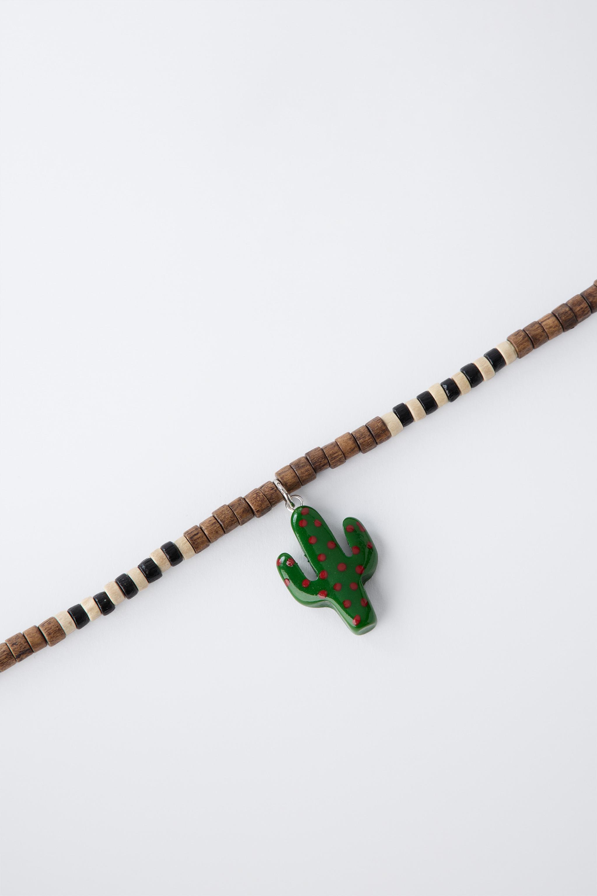 LOT DE DEUX COLLIERS FANTAISIE EN BOIS CACTUS