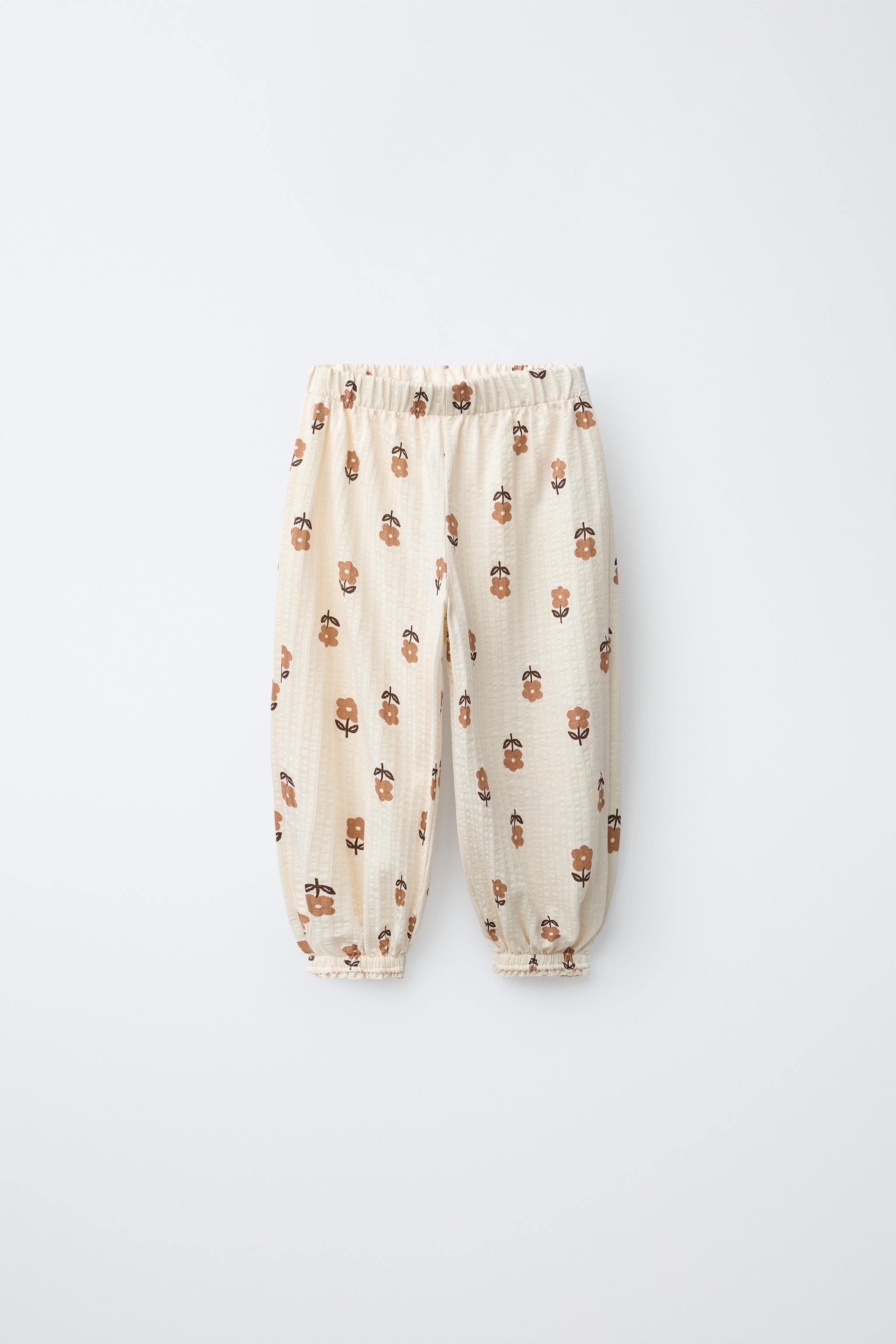 PANTALON DE JOGGING À FLEURS AVEC DÉCOR EN DENTELLE