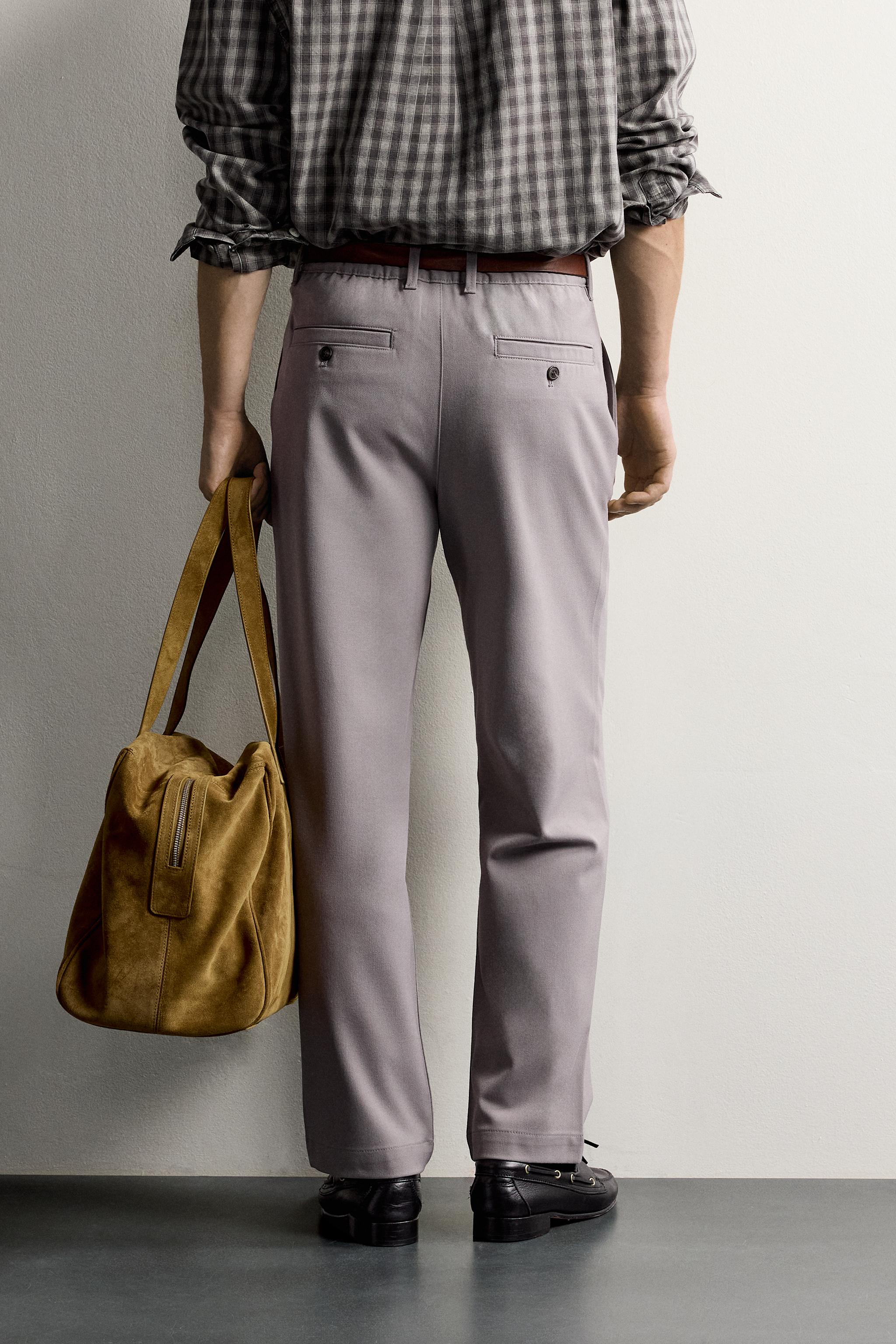 RELAXED FIT PLEATED PANTS