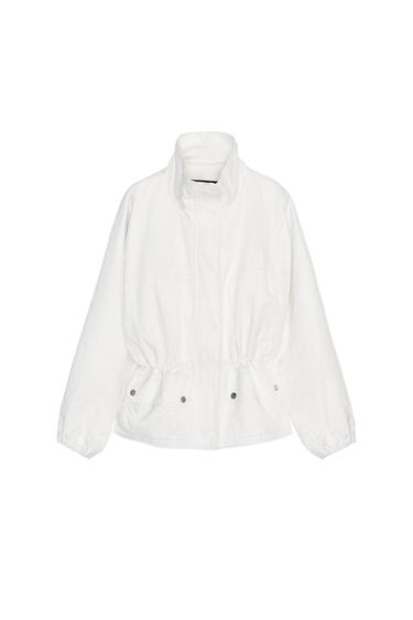 Front view of a white jacket with a high collar and front pockets with buttons.
