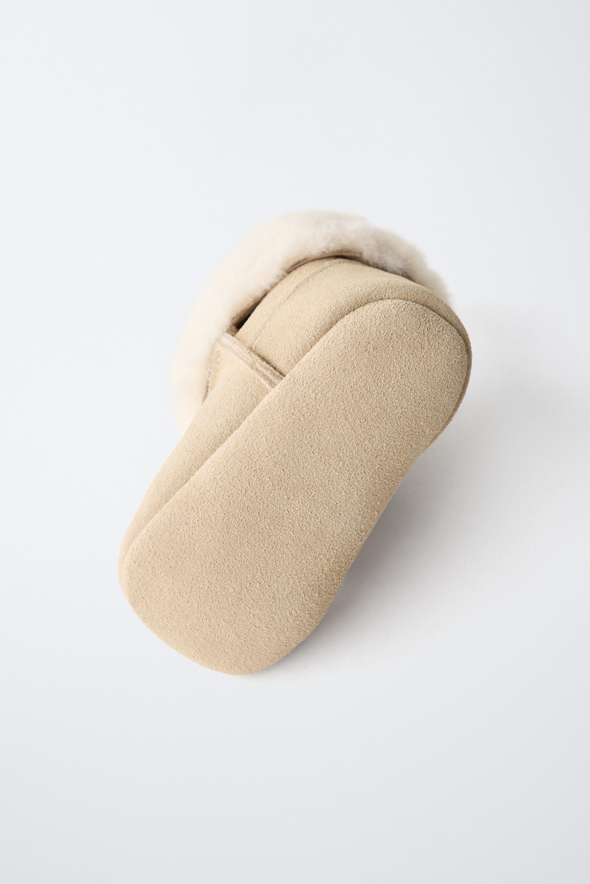 FUR-LINED LEATHER BOOTS