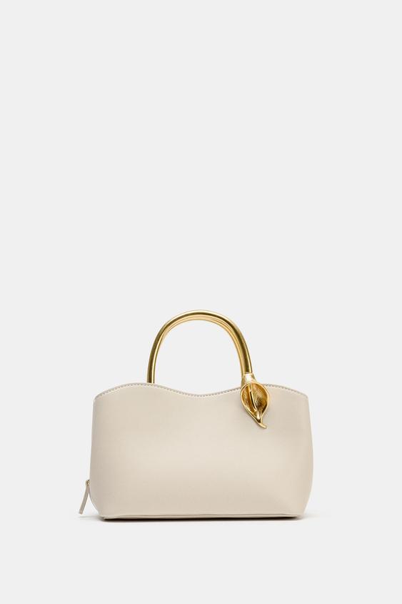 BOLSA COM DETALHE METALIZADO DE FLOR - Cru da Zara - Imagem 0