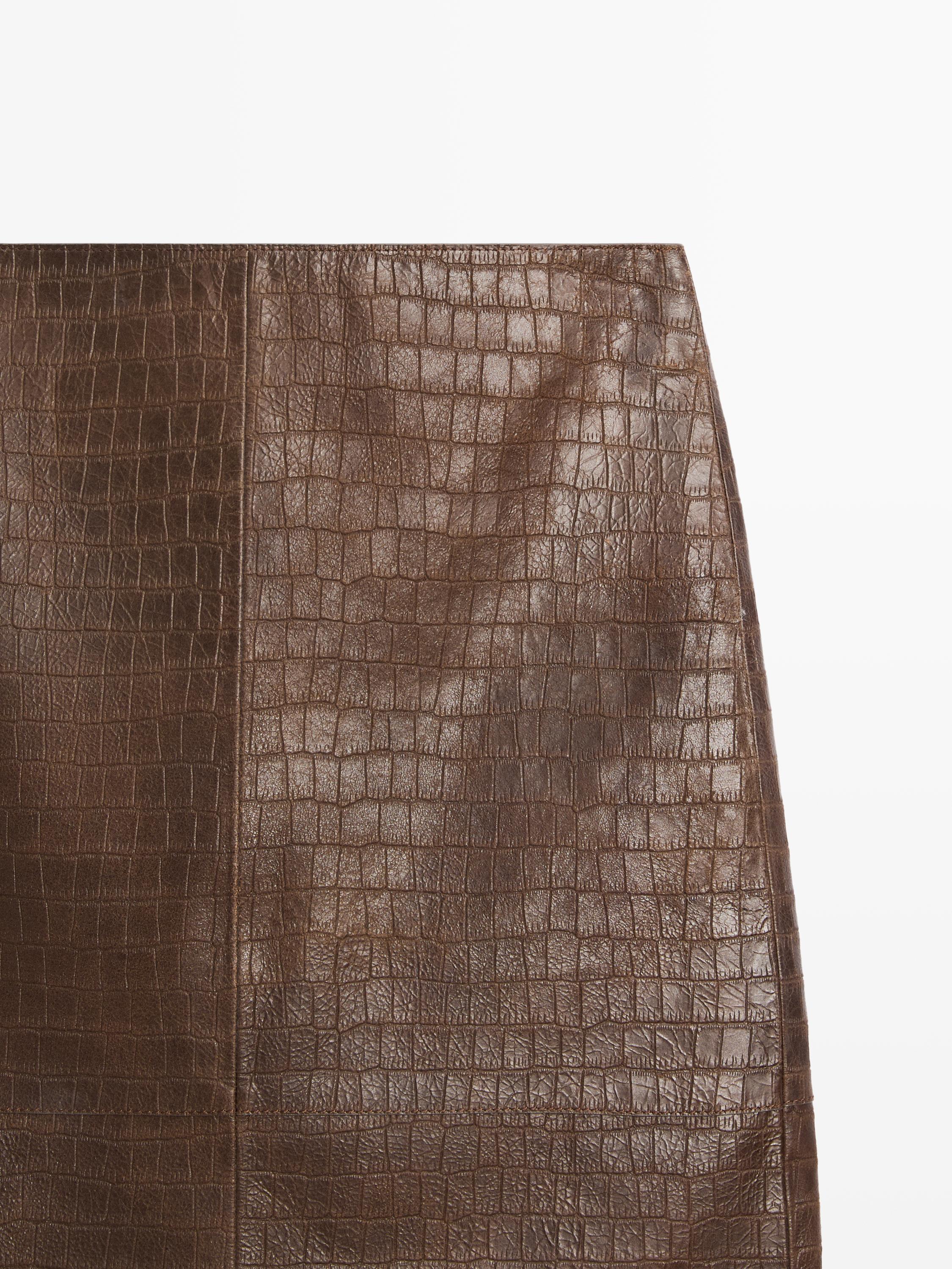 Jupe courte en cuir effet croco