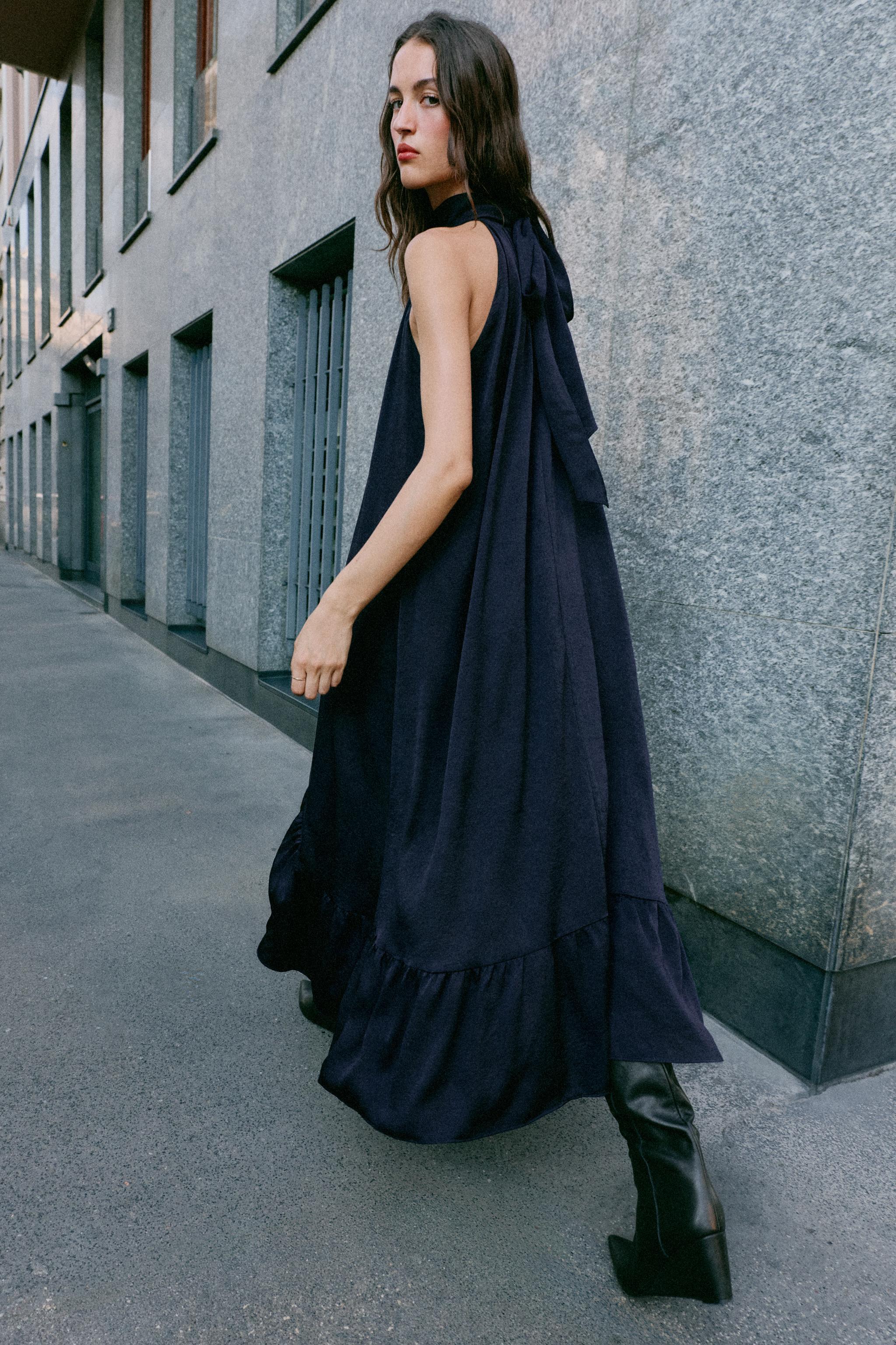 ROBE MI-LONGUE HALTER VOLANT BAS