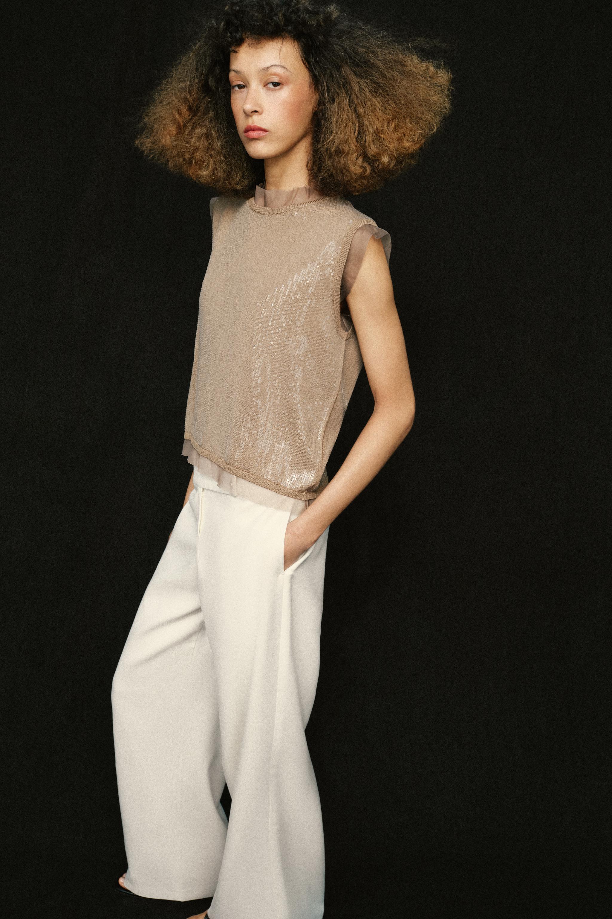 TOP EN MAILLE ET PAILLETTES