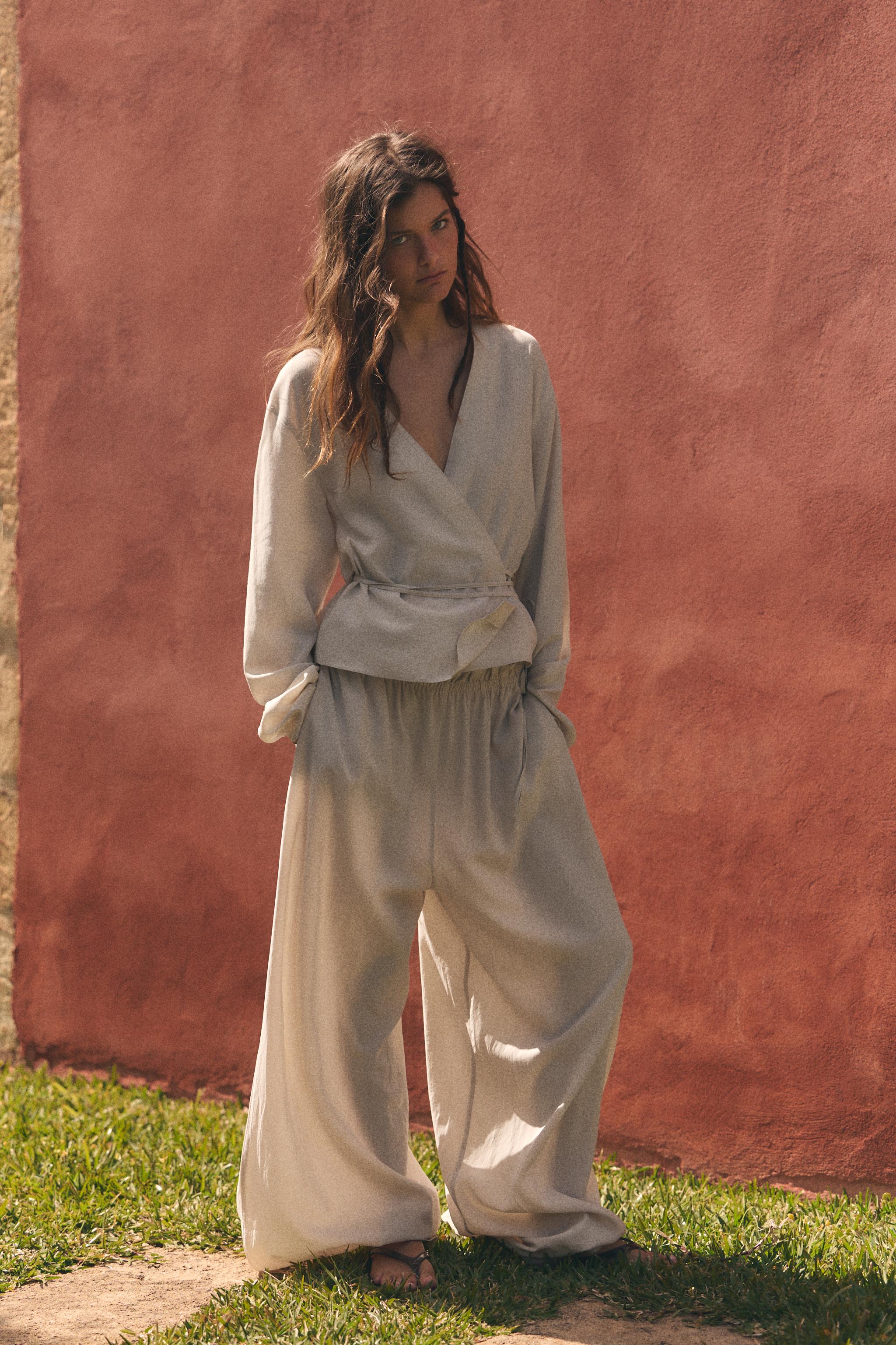 PALAZZO TROUSERS WITH TIE DETAIL