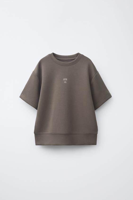 CAMISETA TEXTO SPORTY - Marrón de Zara - Imagen 0