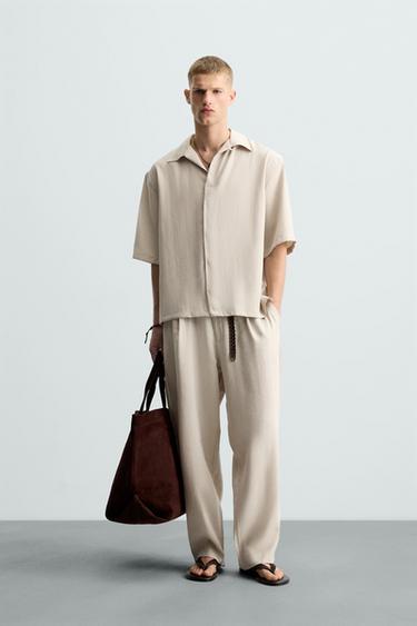 FLOWING PLEATED TROUSERS - Light beige by Zara - Image 0