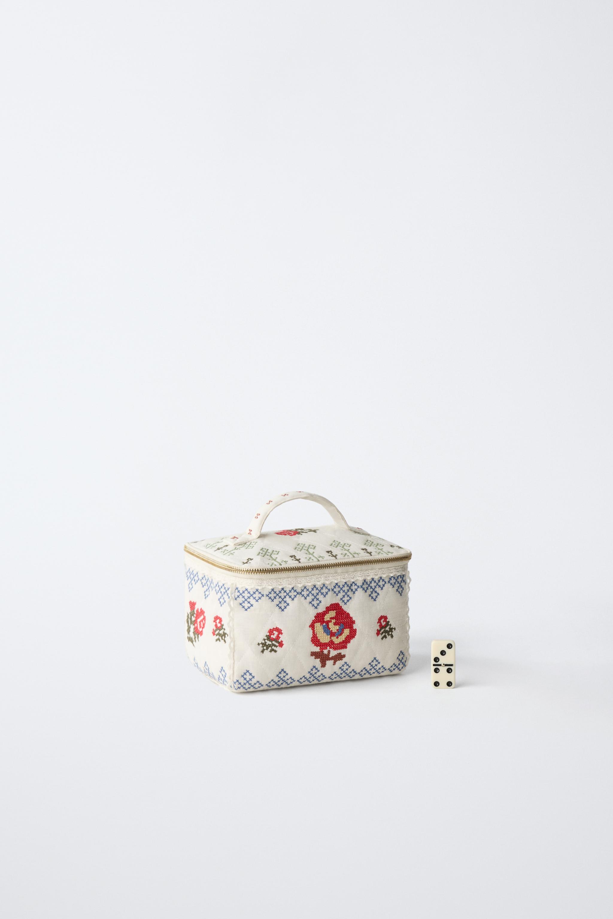 EMBROIDERED TOILETRY BAG