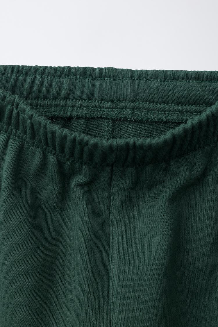Conjunto de sudadera y joggers con franja lateral 7