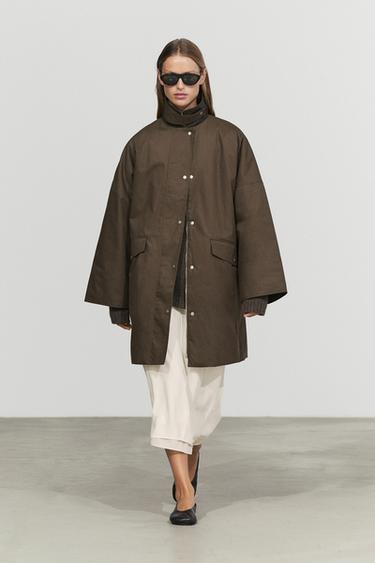 Chaqueta efecto encerado interior cuadros - oliva de Zara - Imagen 0