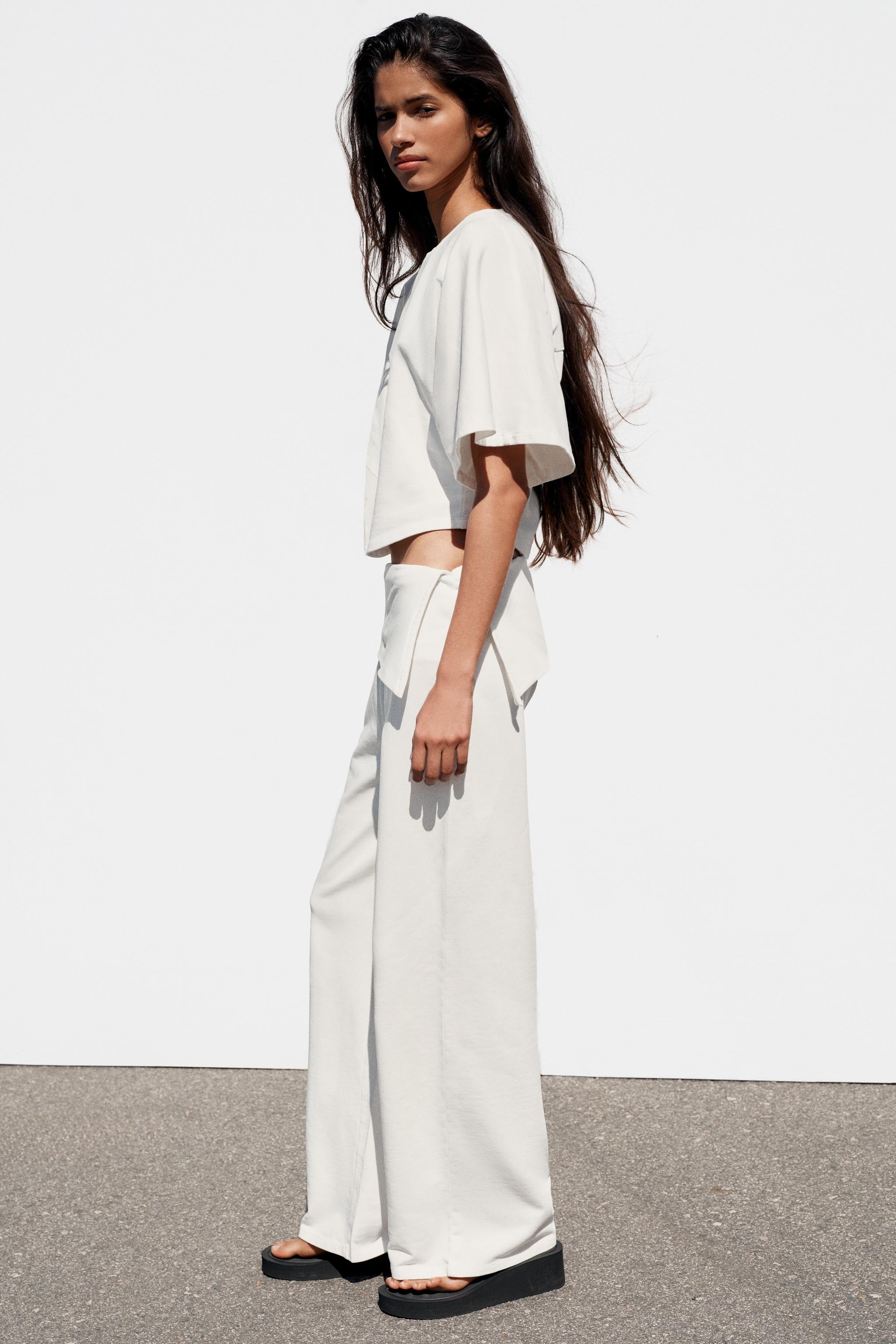 ASYMMETRIC WAIST PANTS