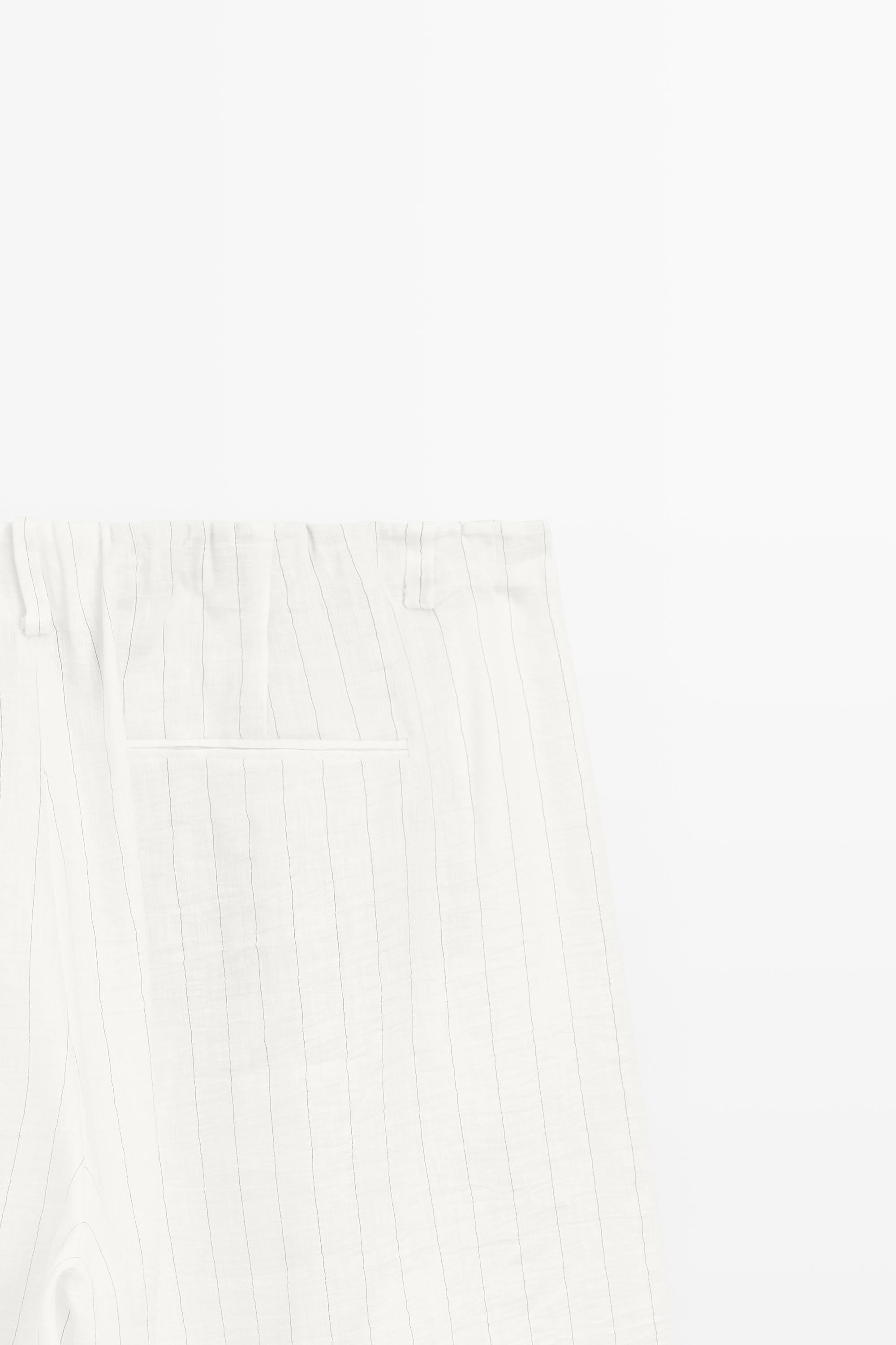 Striped pleated flowing pants - STUDIO