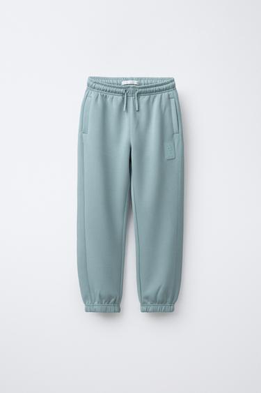 SPORTY JOGGERS WITH RUBBERISED LABEL - Blue / Grey by Zara
