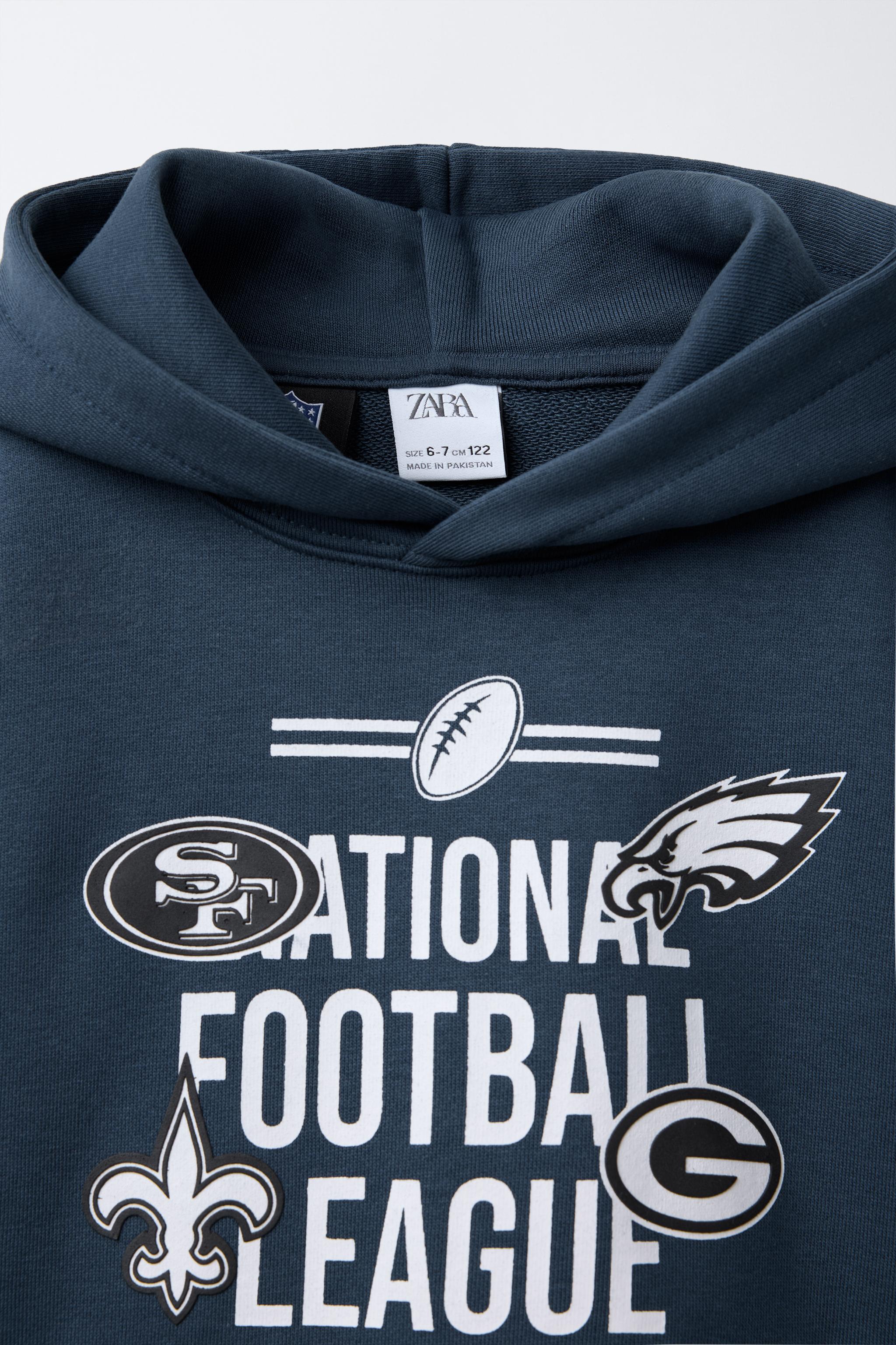 マルチチーム © NFL フーディ - ベージュ/ゴールデンブラウン