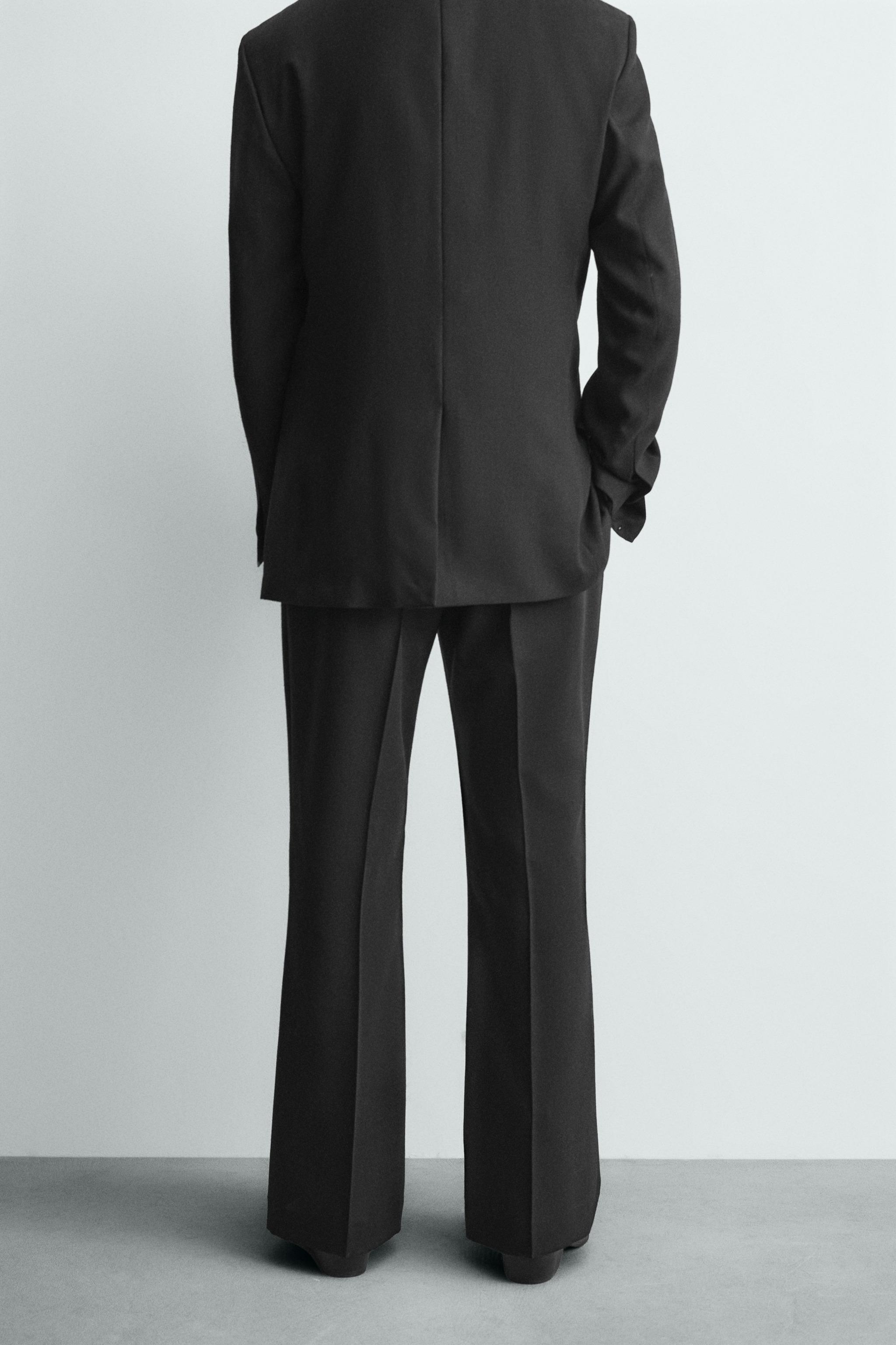 LIMITED EDITION WOOL FLARE FIT SUIT PANTS