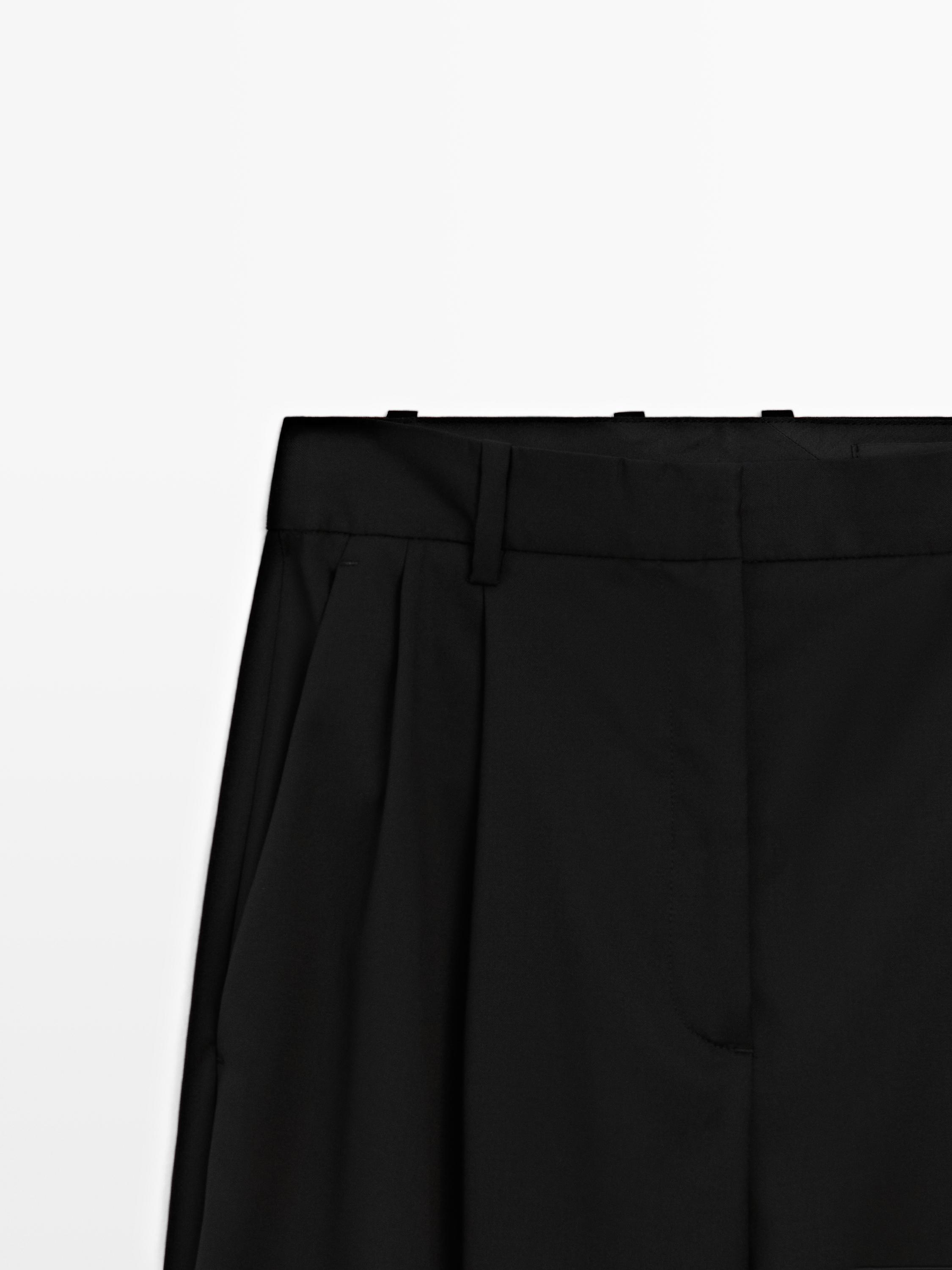 Pleated extra fine wool trousers