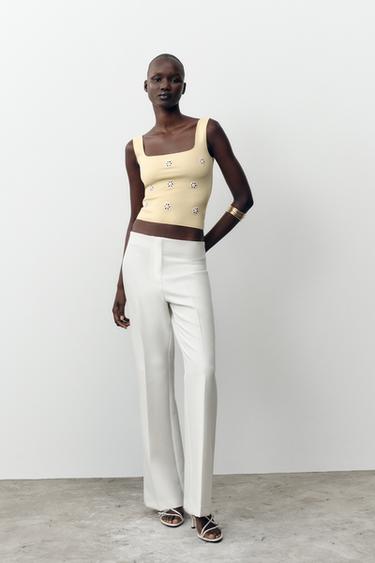 ТОП С ЕЛАСТИЧНА МАТЕРИЯ И БРОДЕРИЯ НА ЦВЕТЯ - Жълто от Zara
