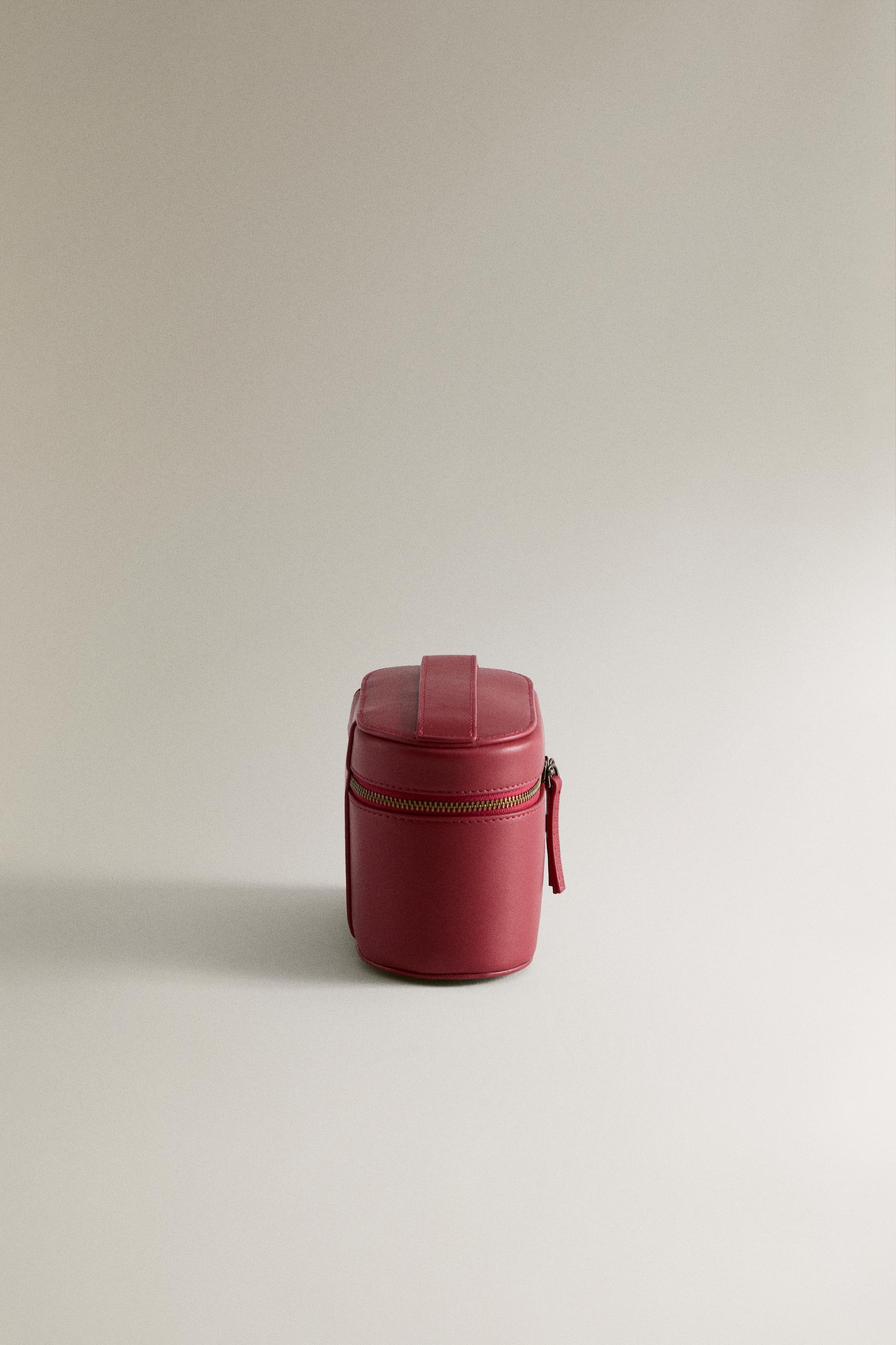 MINI TROUSSE DE TOILETTE RIGIDE EN CUIR