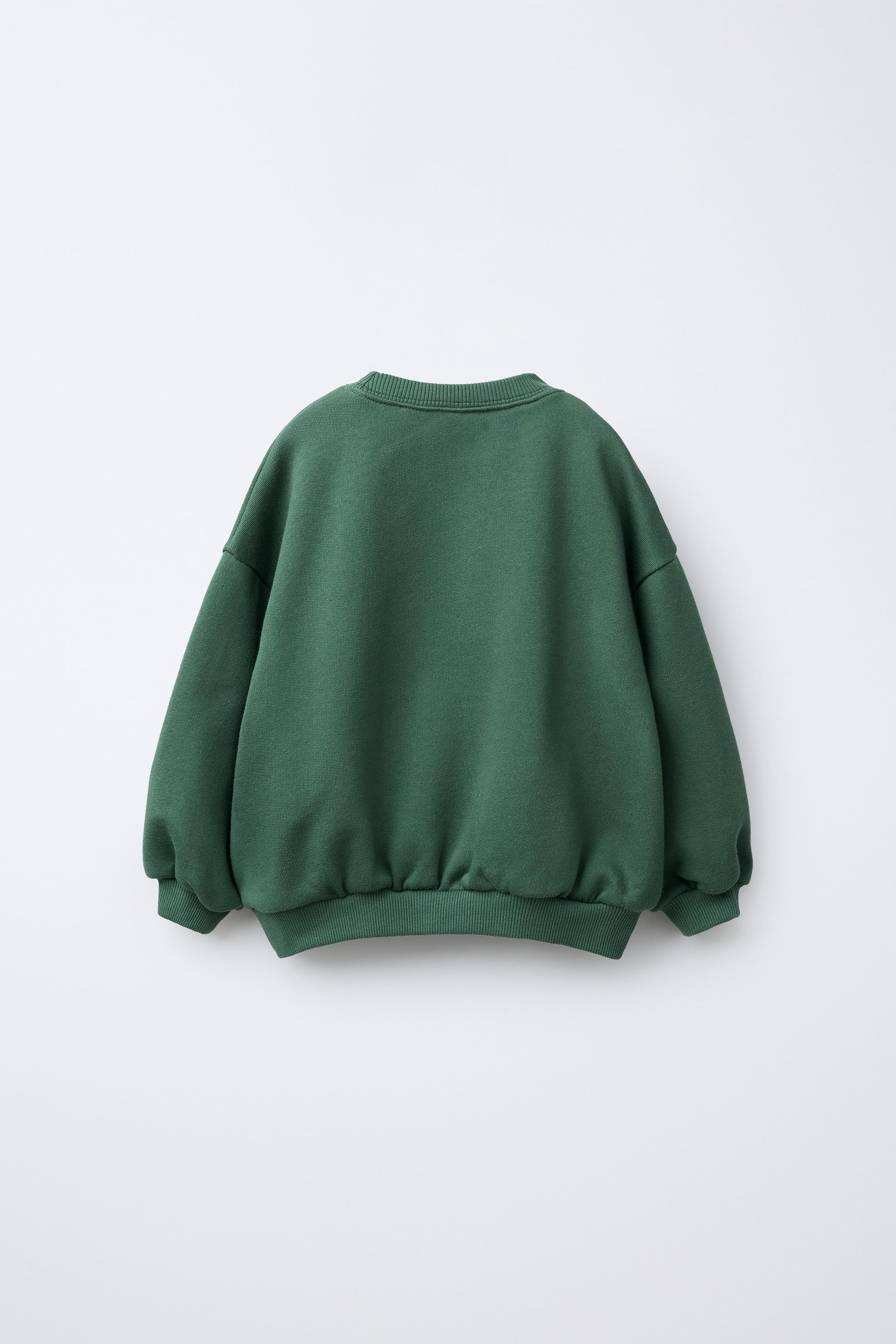 SWEAT AVEC IMPRIMÉ INSCRIPTION