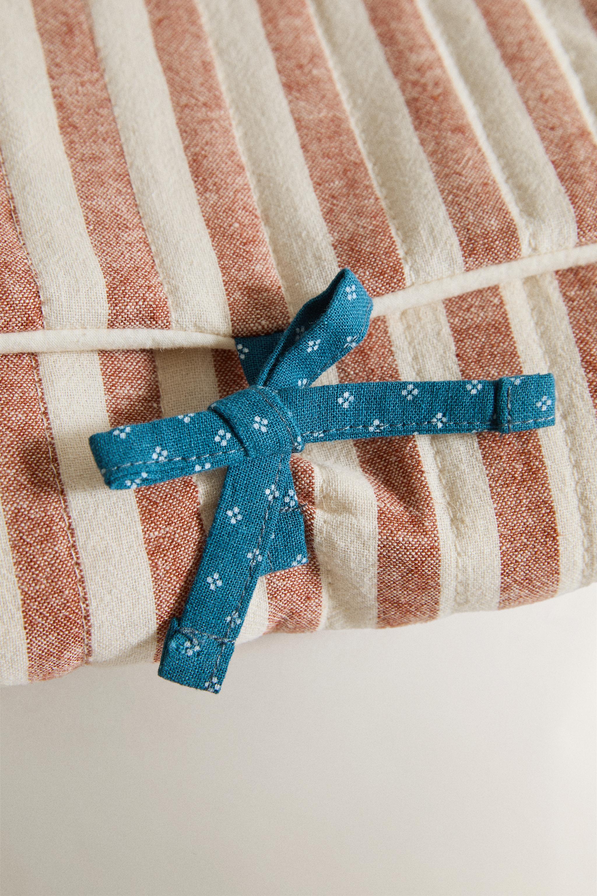 PORTABLE STRIPED BABY CHANGING MAT — Brick
