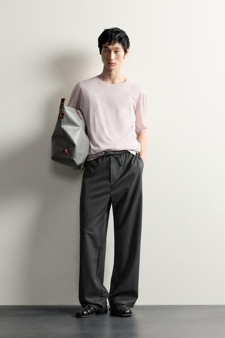 RELAXED FIT FLOWING TROUSERS