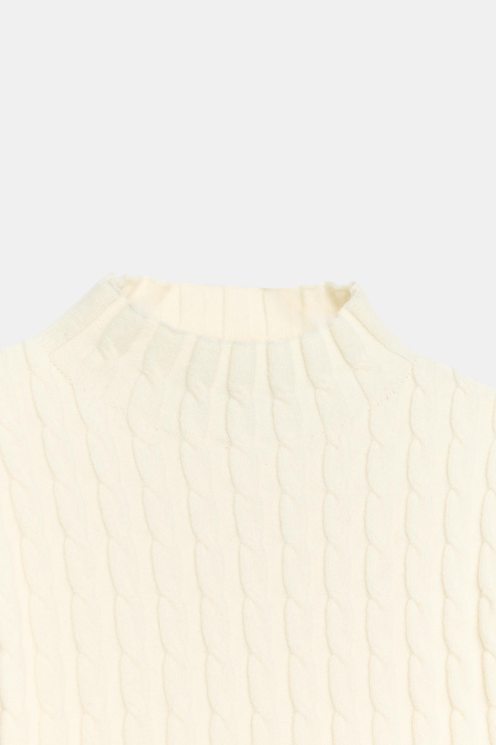 PULL EN MAILLE TORSADÉE À VOLANTS