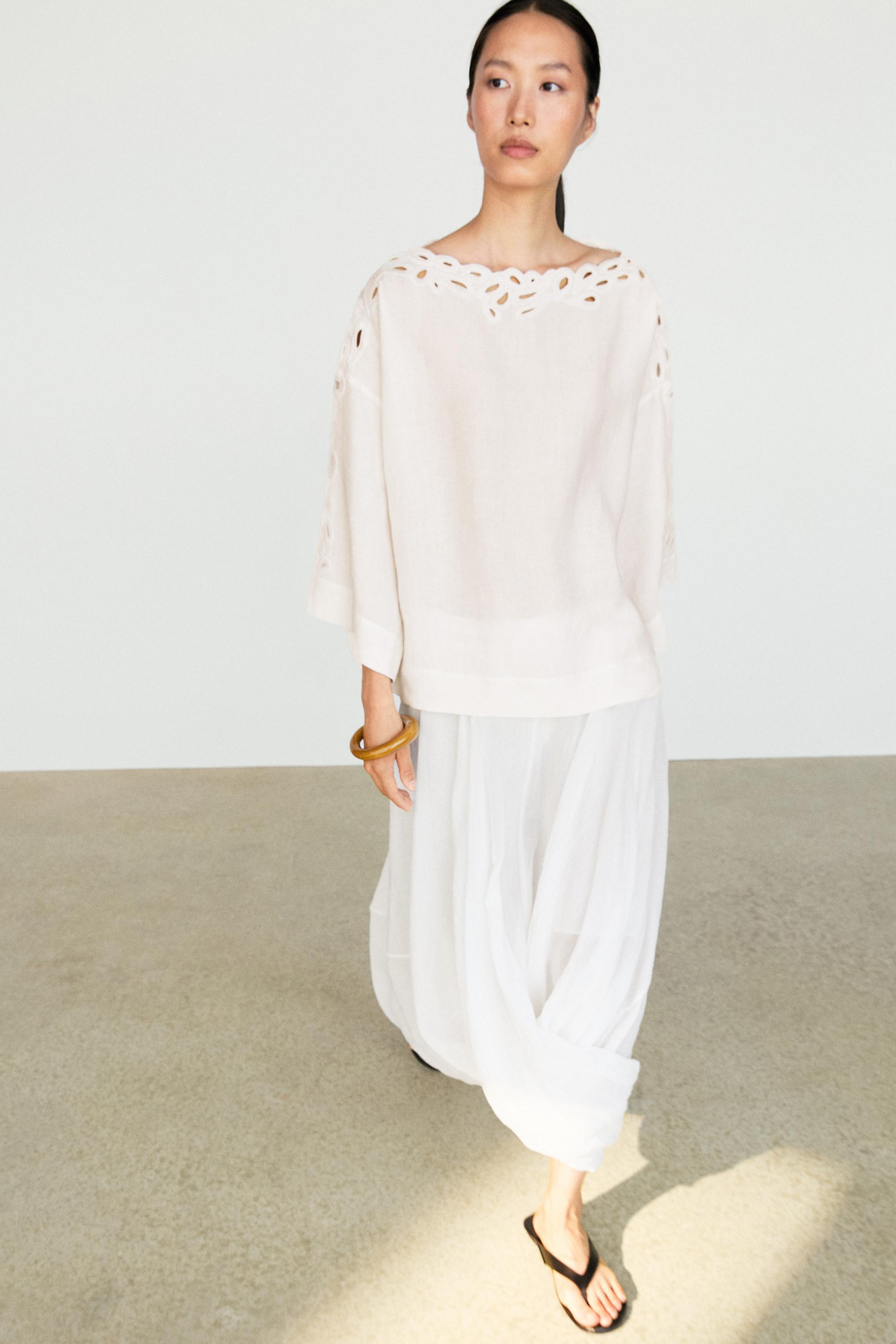 Linen boat neck blouse with embroidery — Ecru