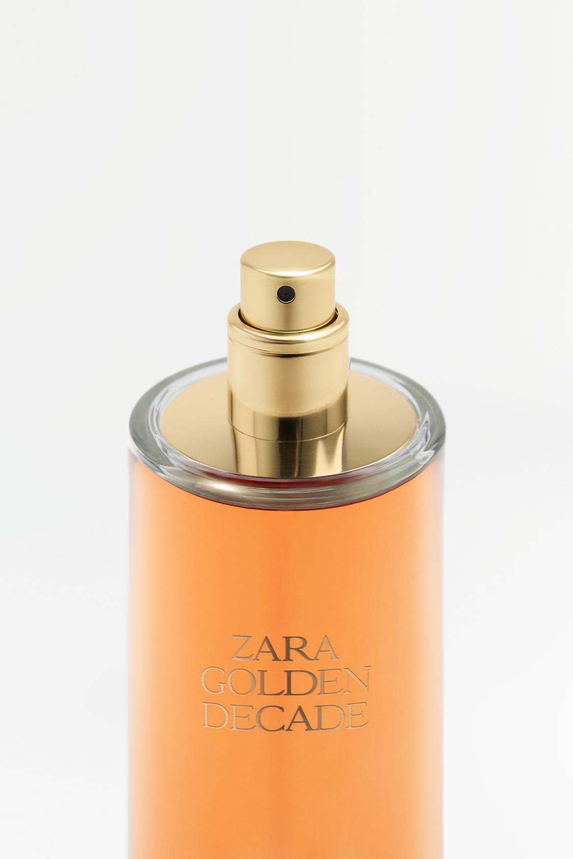 Podrobnosti o steklenički parfuma z napisom "ZARA GOLDEN DECADE" in zlato kapico.