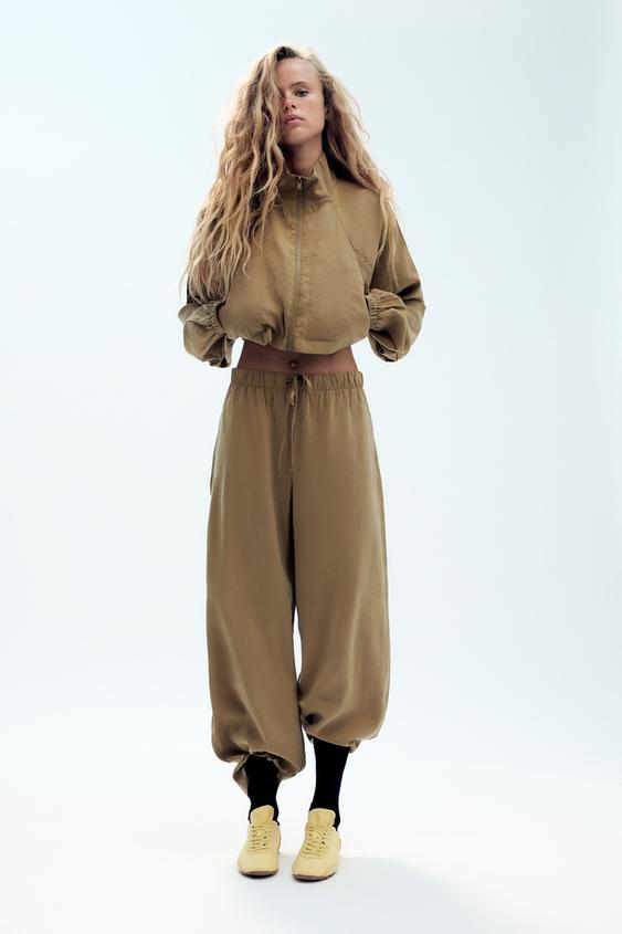 PANTALÓN FLUIDO CINTURA ELÁSTICA - Khaki de Zara - Imagen 0
