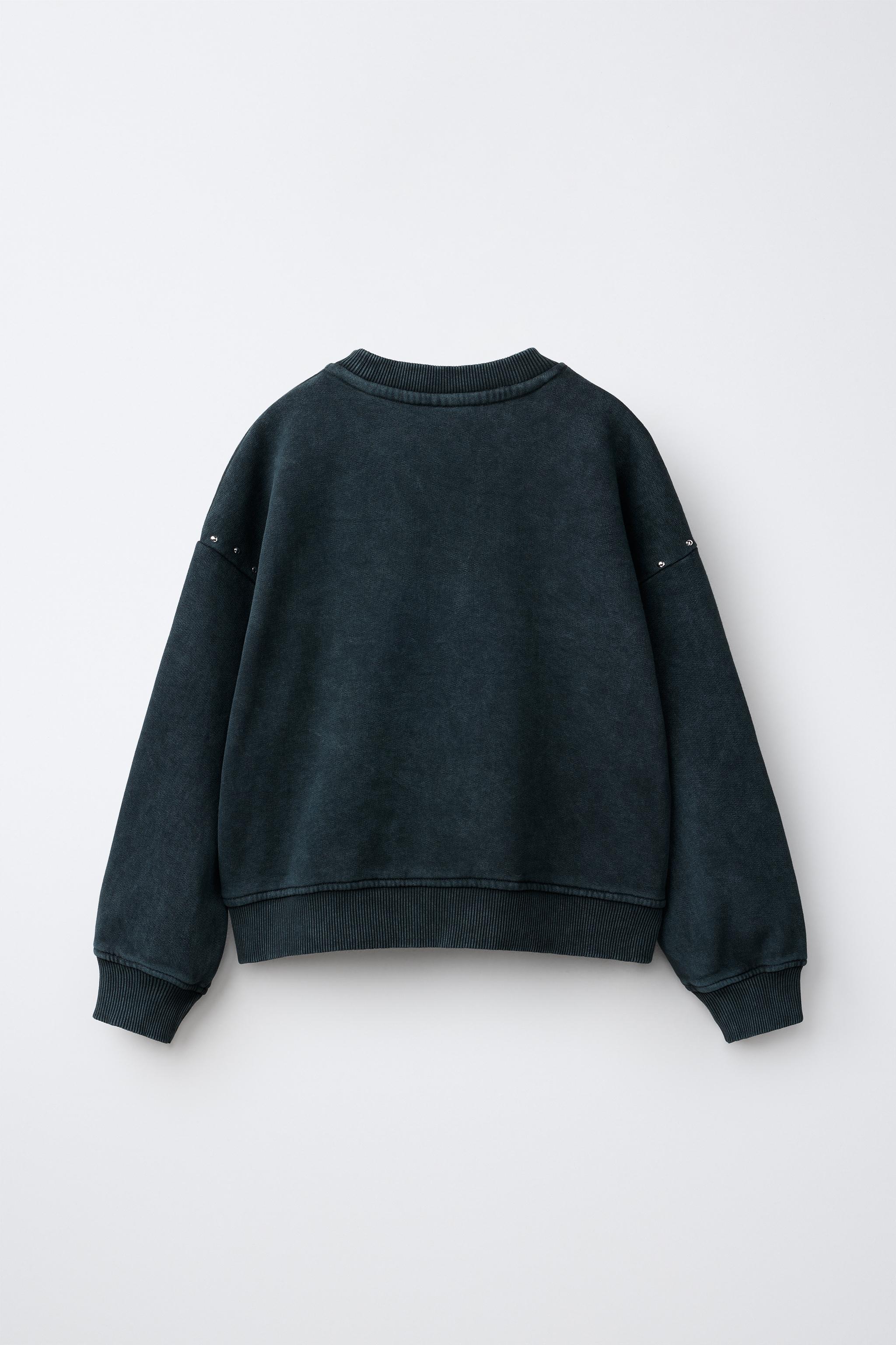 STUDDED STAR PRINT SWEATSHIRT