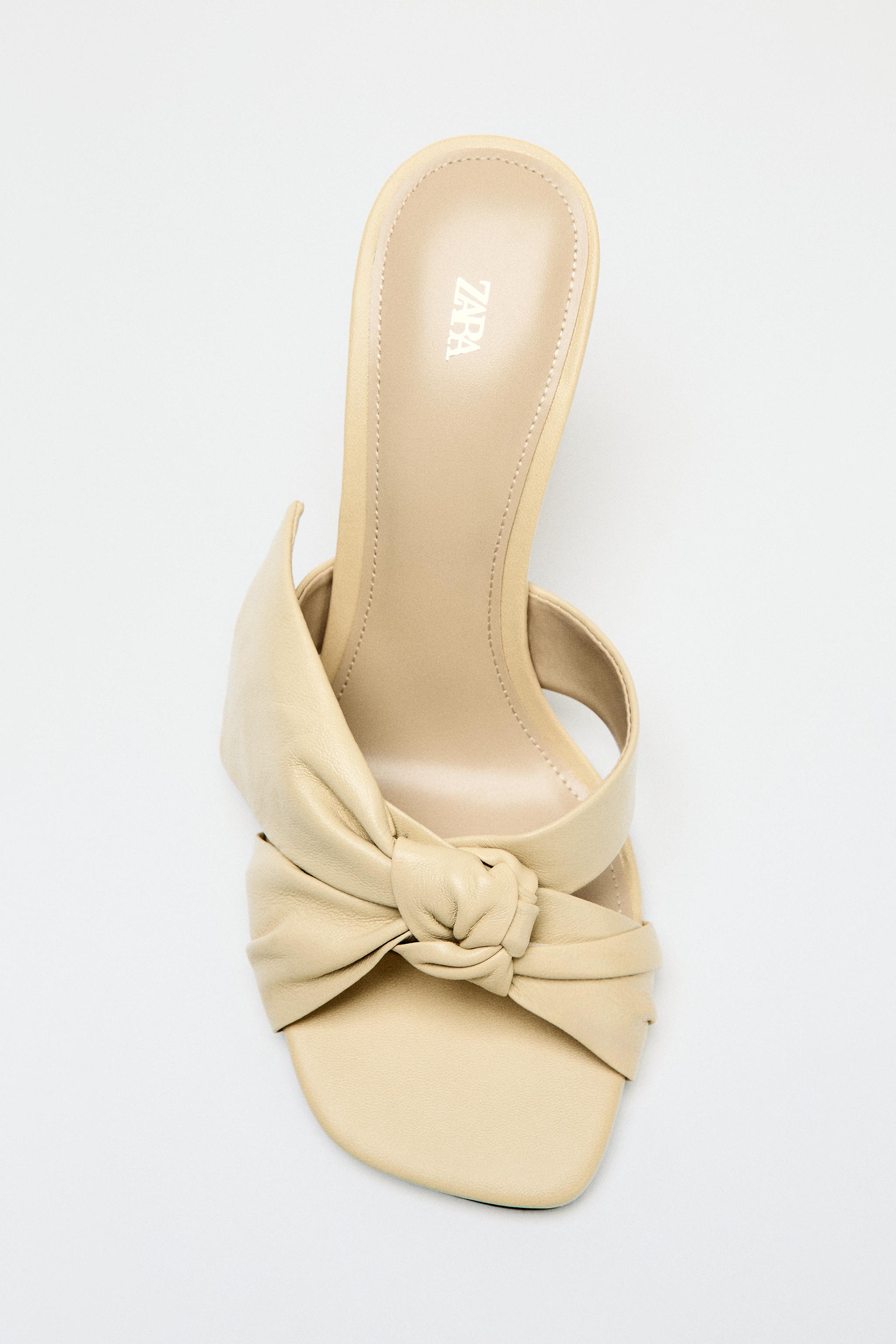 LEATHER BOW HEELED SANDALS