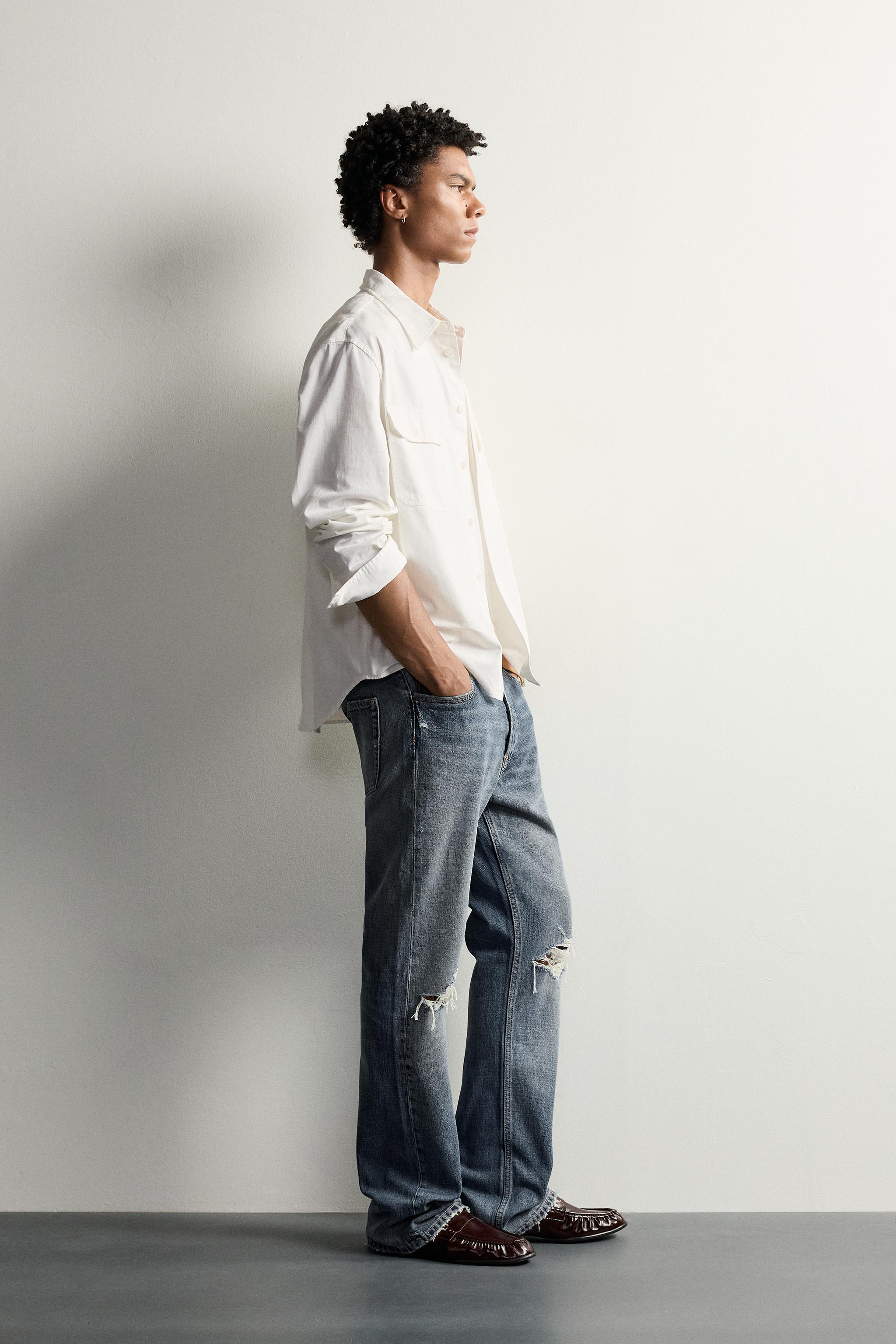 JEANS FLARE FIT DÉCHIRURES