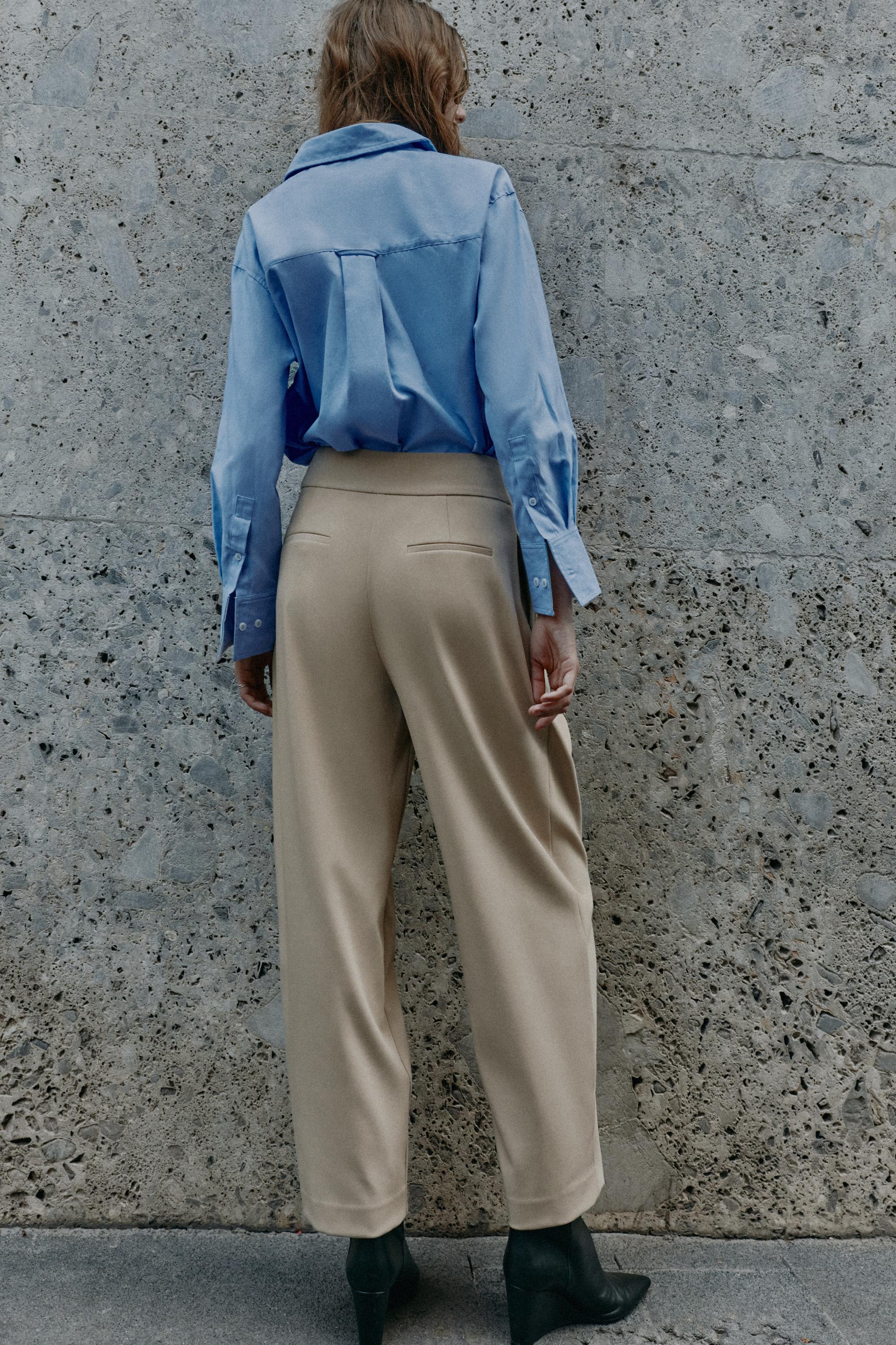 PLEATED CARROT TROUSERS