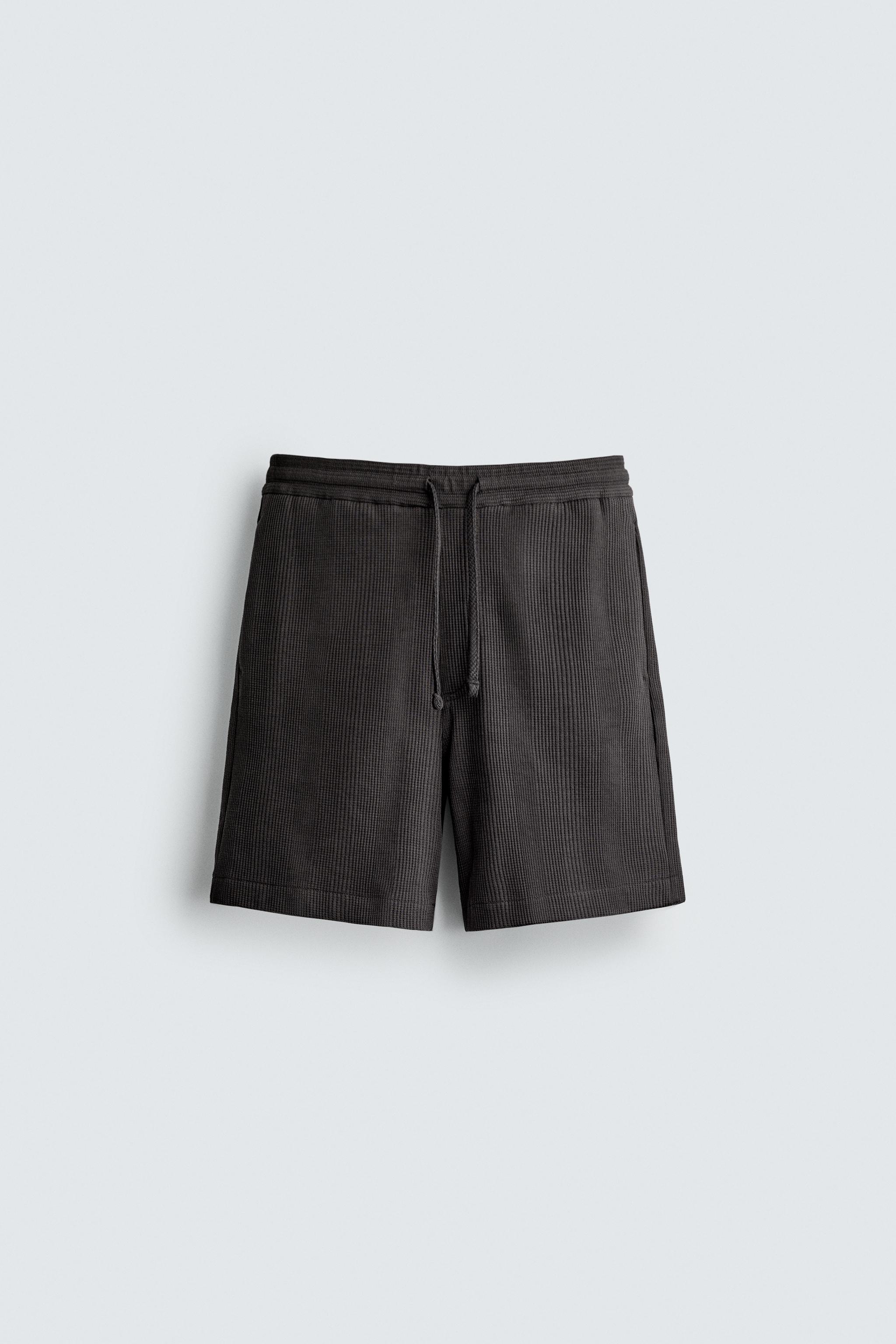 TEXTURED RELAXED FIT SHORTS