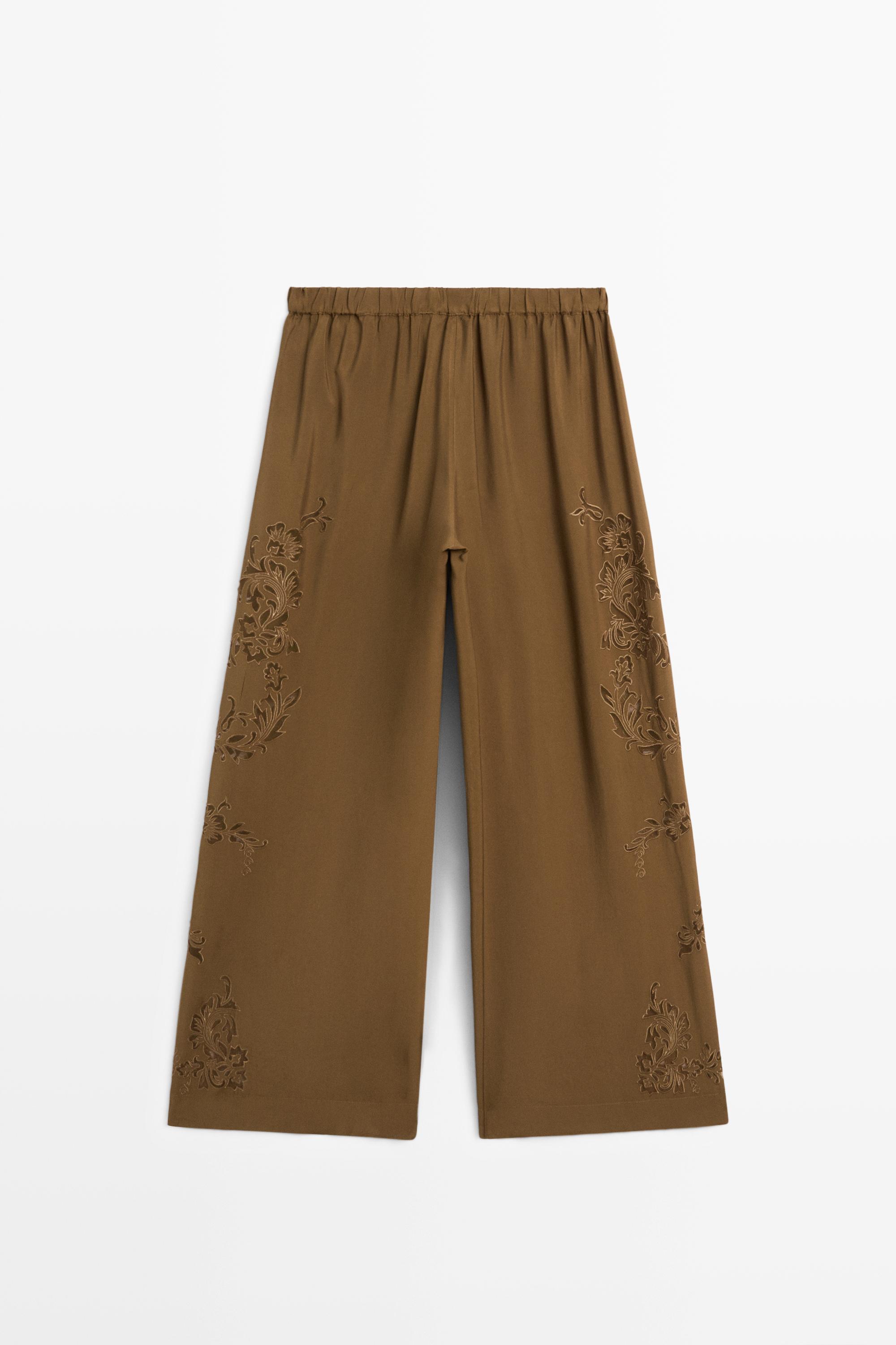 Flowing wide-leg pants with embroidery details
