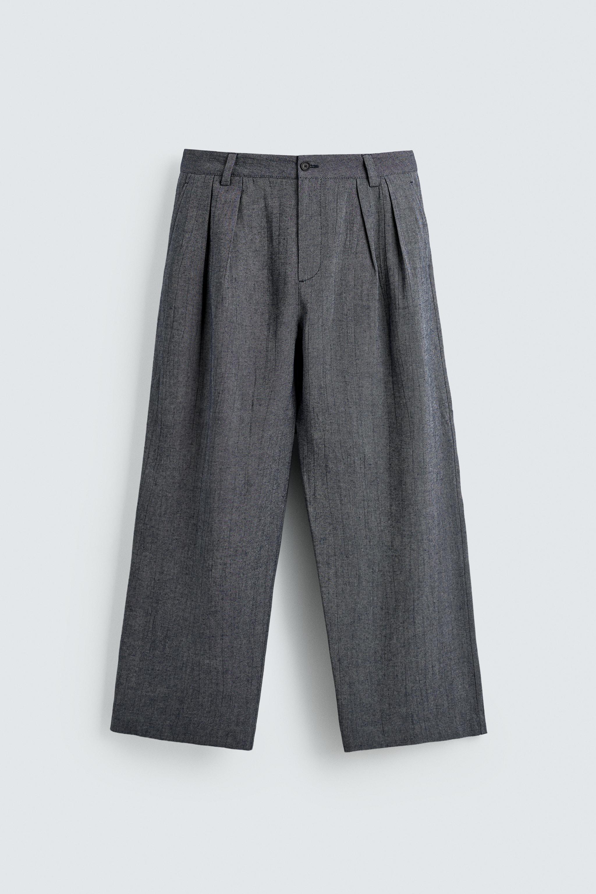 PLEATED RELAXED FIT PANTS