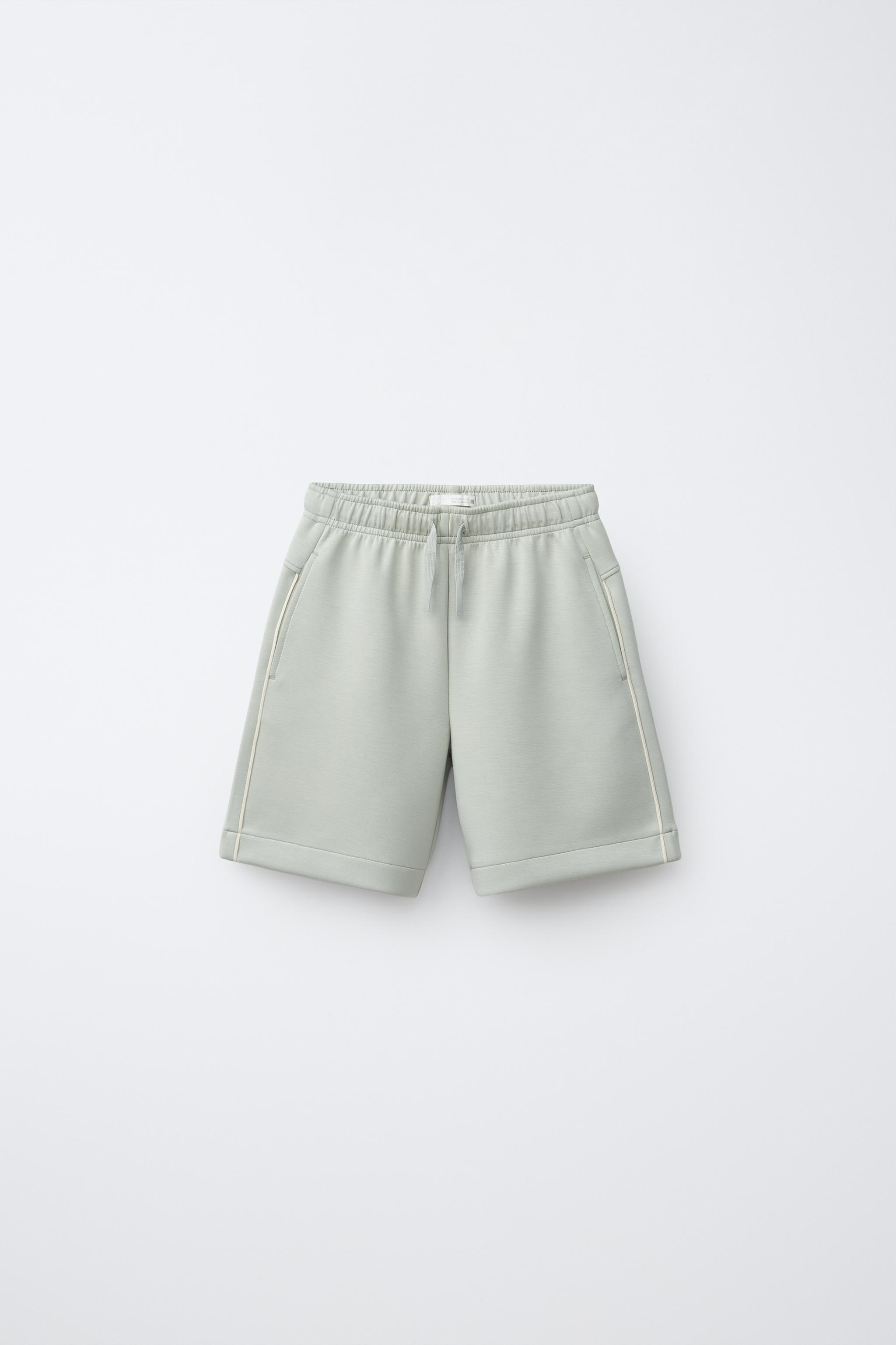 PIPED ATHLETIC SHORTS