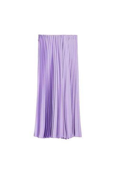 Lilac pleated skirt on a white background. The fabric has a subtle sheen that highlights the textures of the pleats.