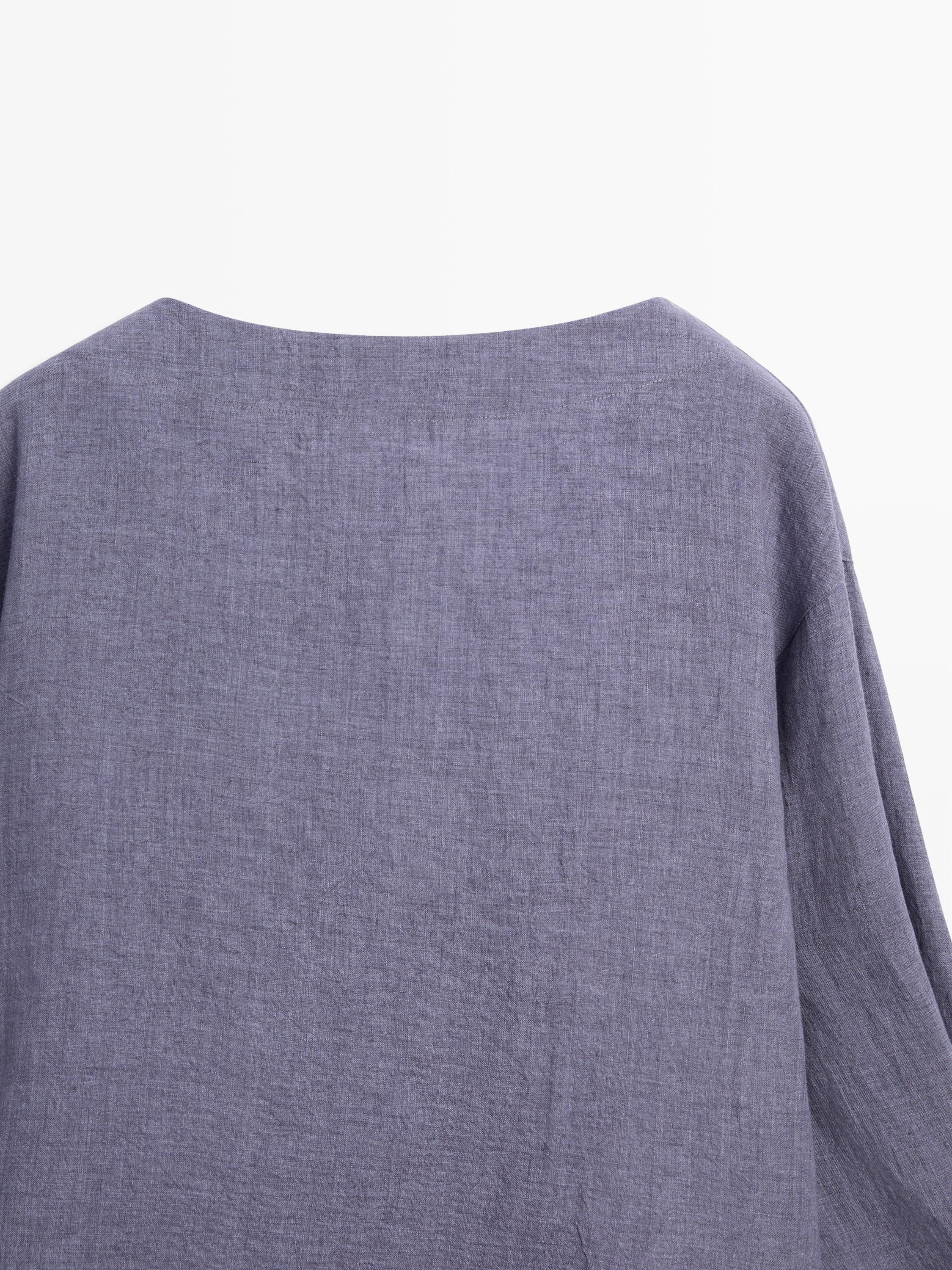 V-neck blouse with sleeve detail