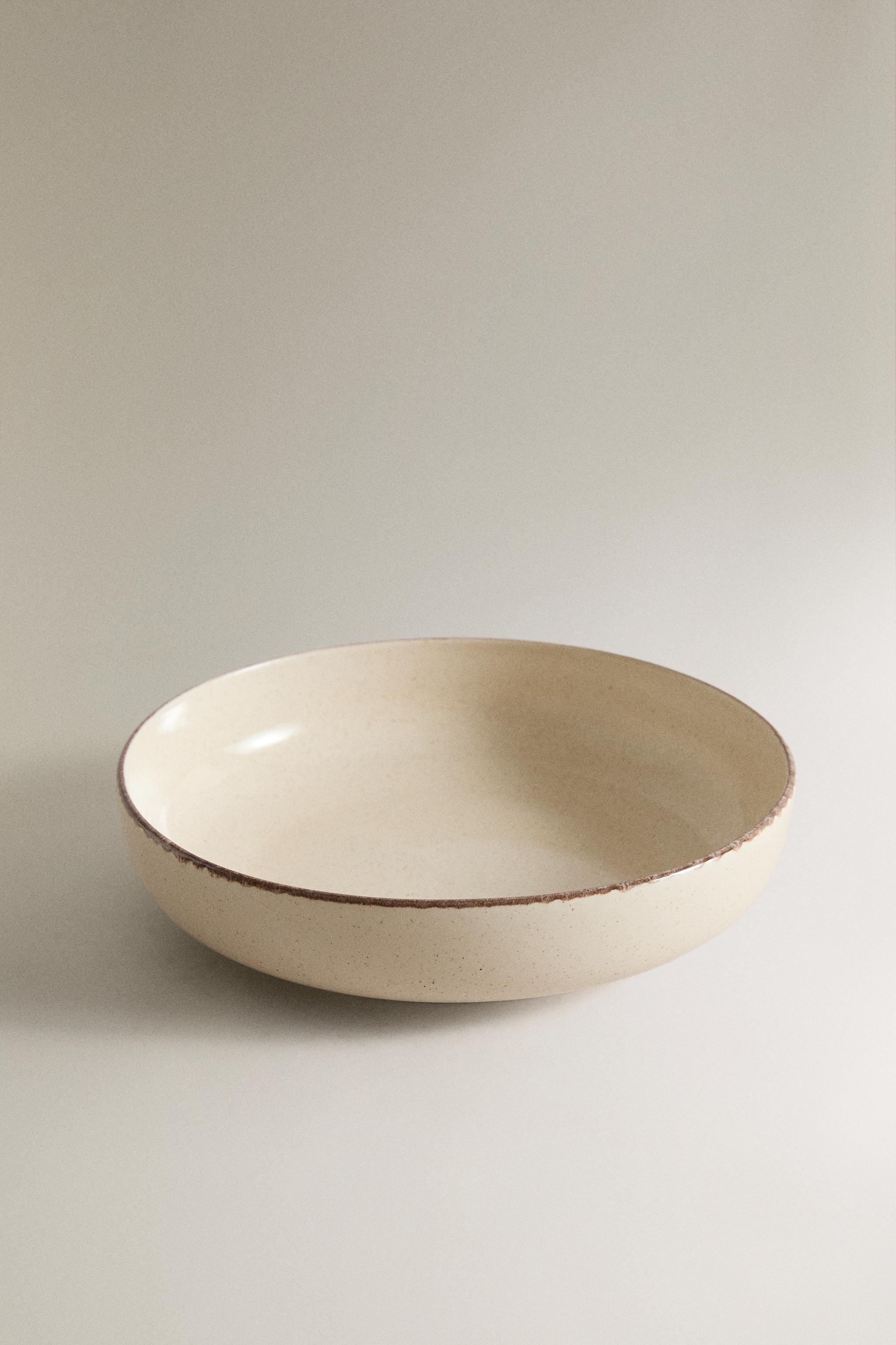 STONEWARE SOUP PLATE WITH AGED RIM