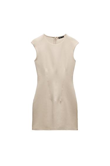 Front view of beige fitted dress with back zip