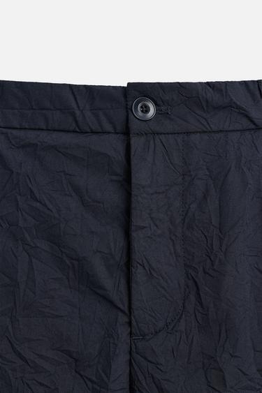 PANTALON EN COTON À EFFET PLISSÉ - Bleu marine de Zara - Image 9